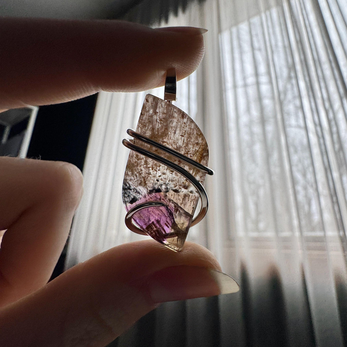 Faceted super seven in sterling silver pendant