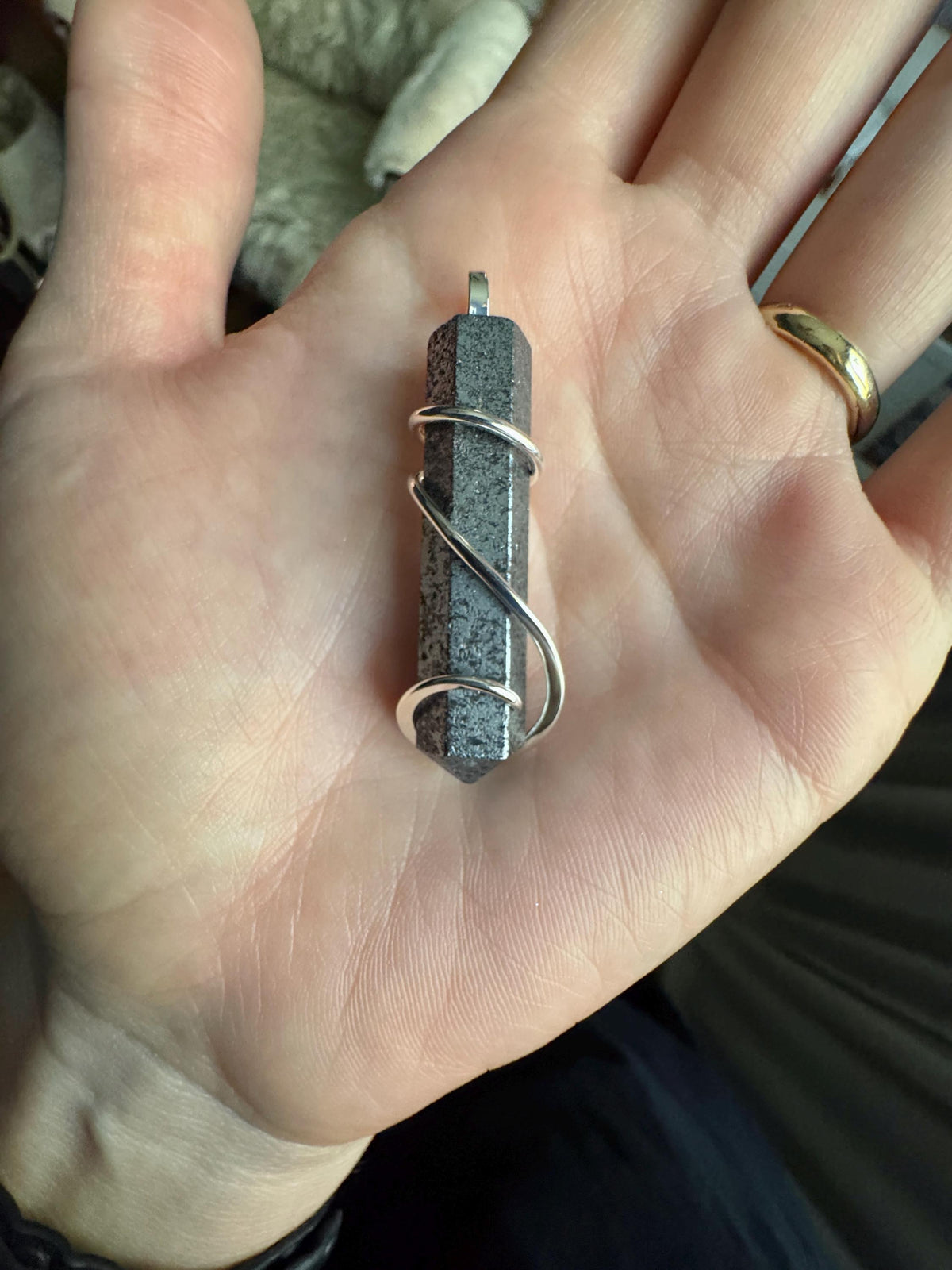 Hematite point in sterling silver pendant