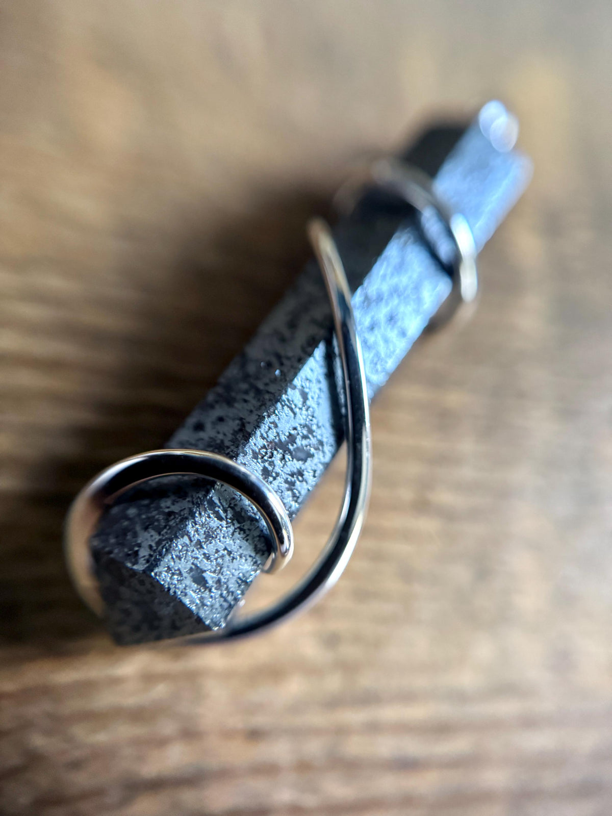 Hematite point in sterling silver pendant