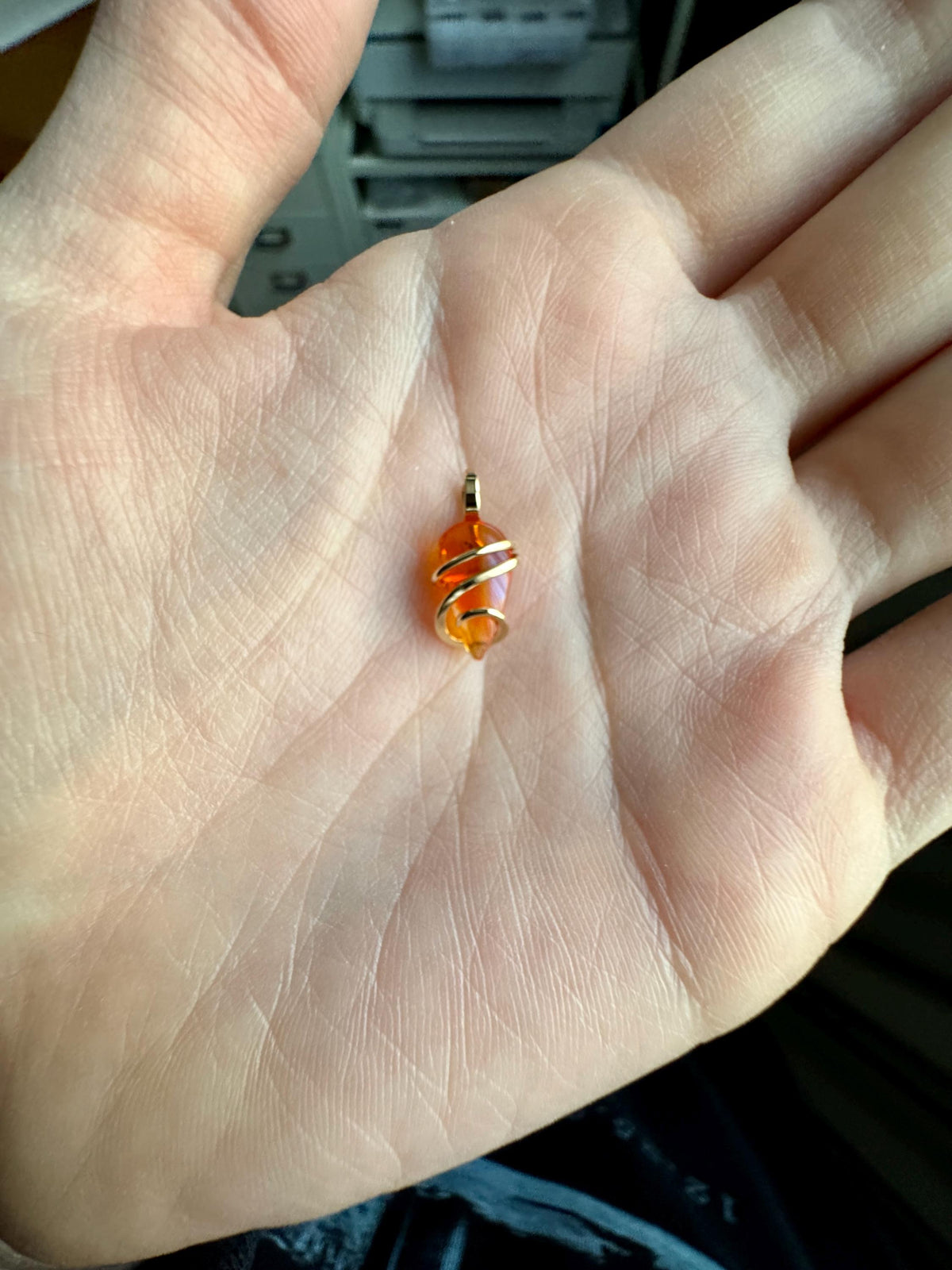 Fire opal in 14k gold pendant