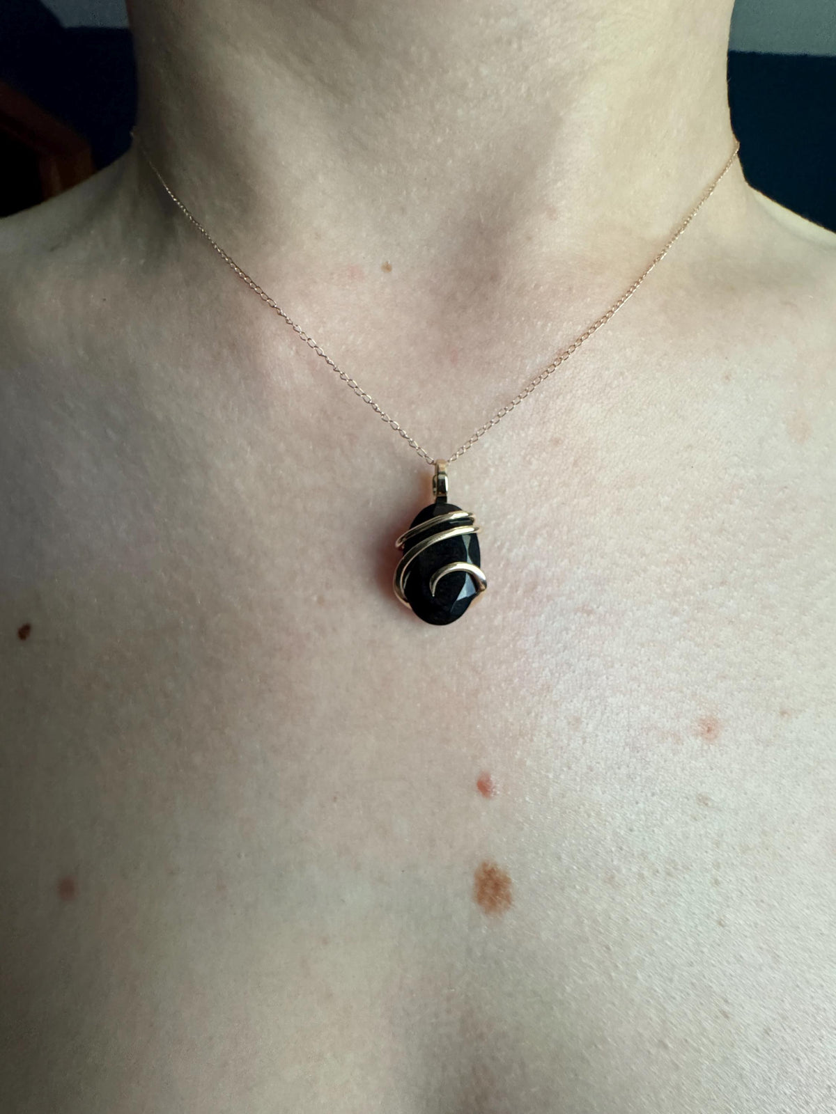 Faceted black tourmaline in 14k gold pendant