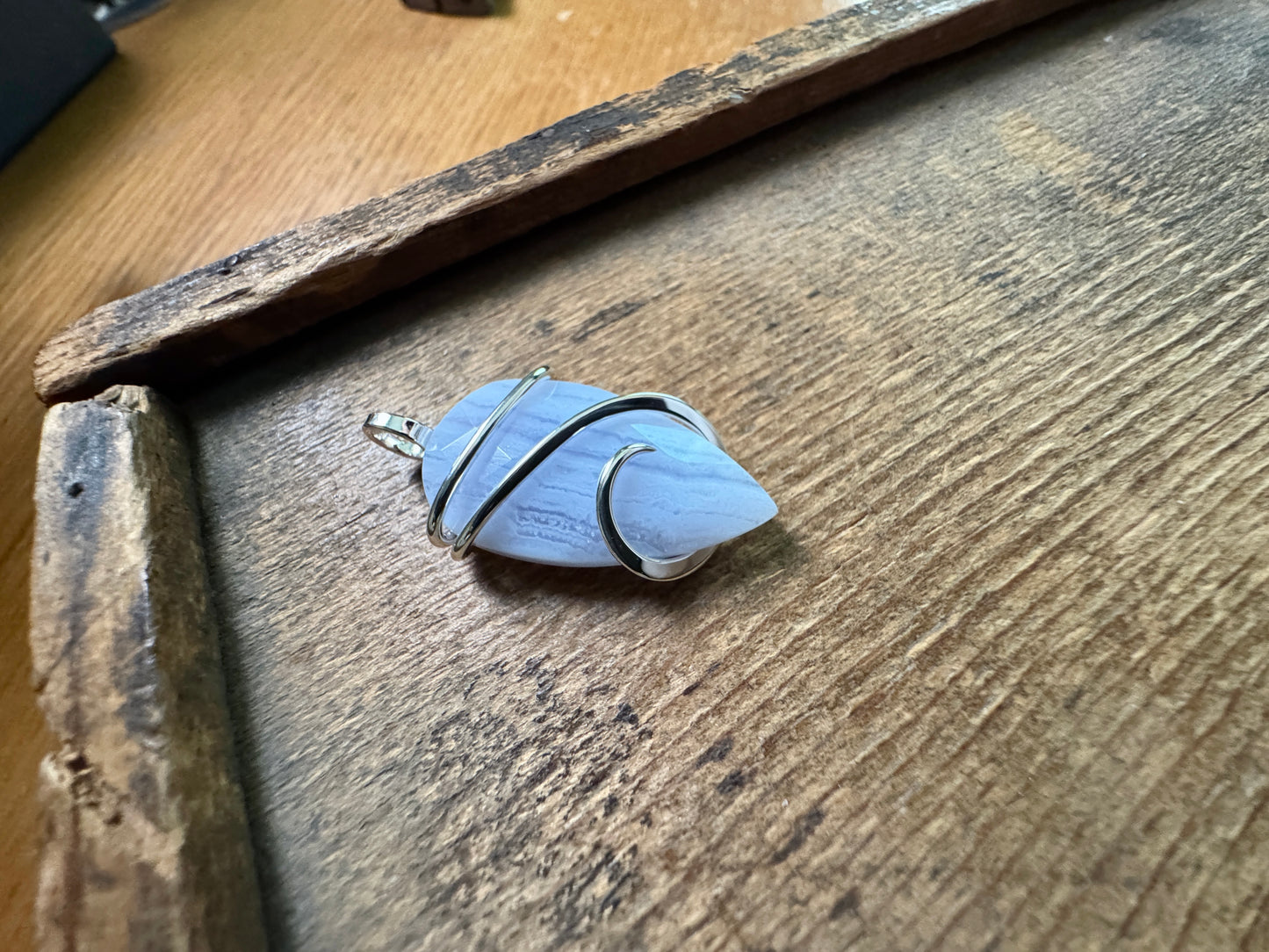 Faceted blue lace agate in sterling silver pendant
