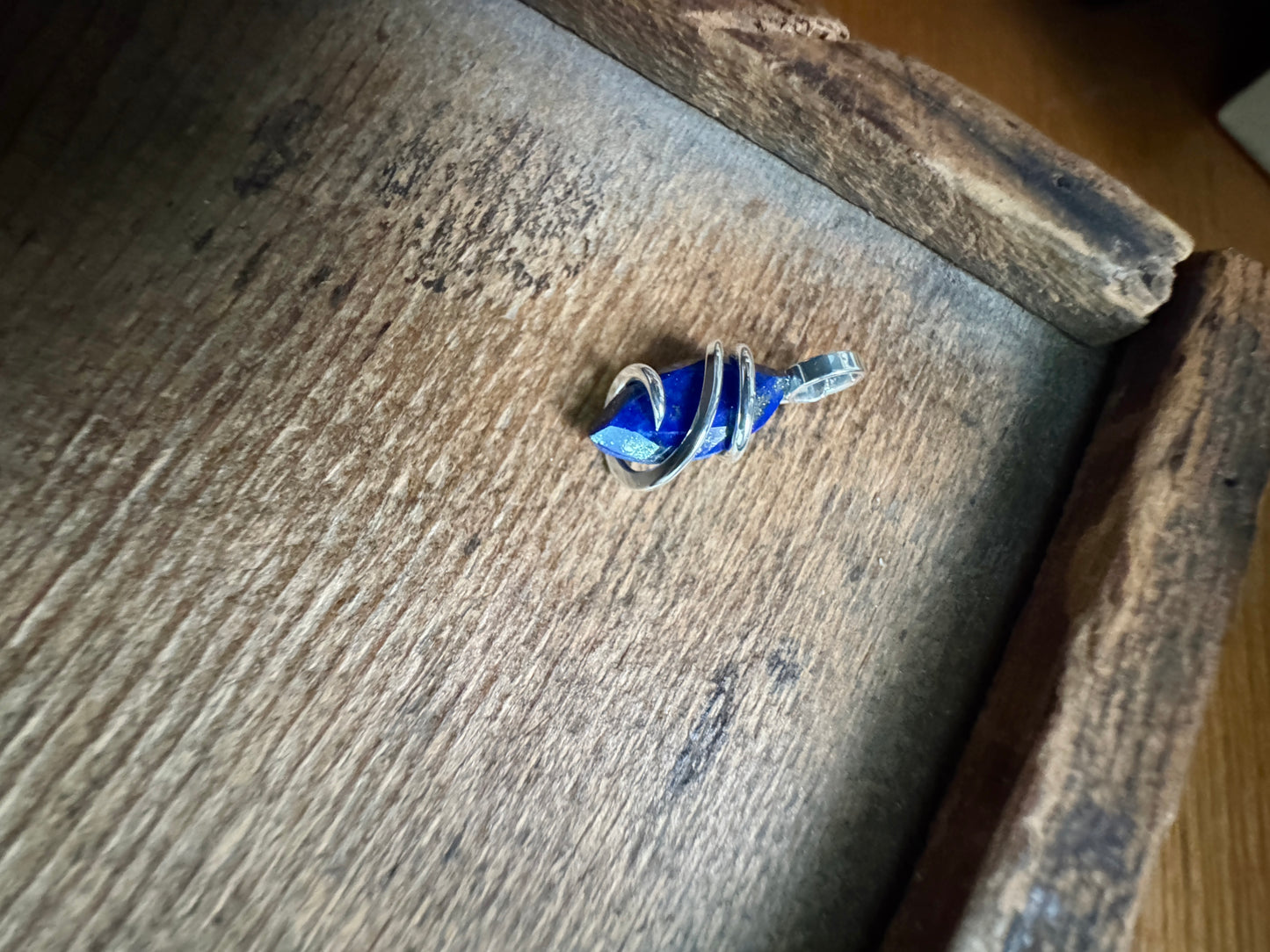Faceted lapis in sterling silver pendant