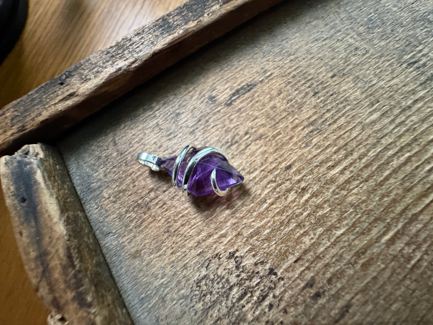 Faceted amethyst in sterling silver pendant