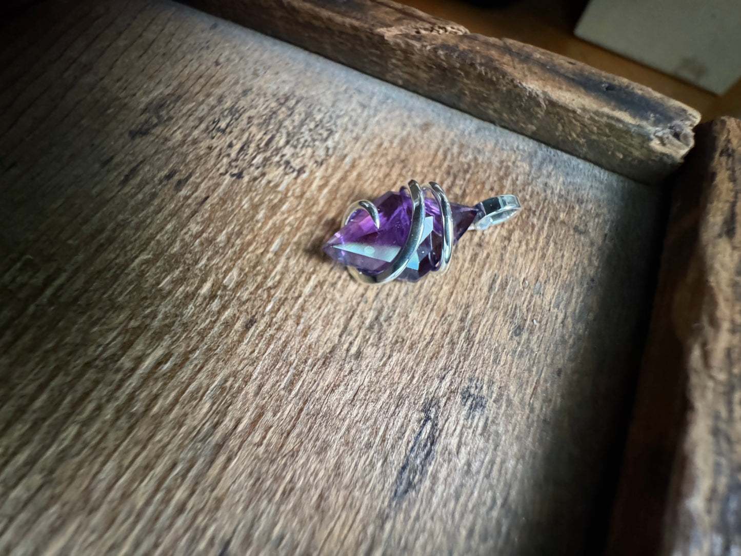 Faceted amethyst in sterling silver pendant