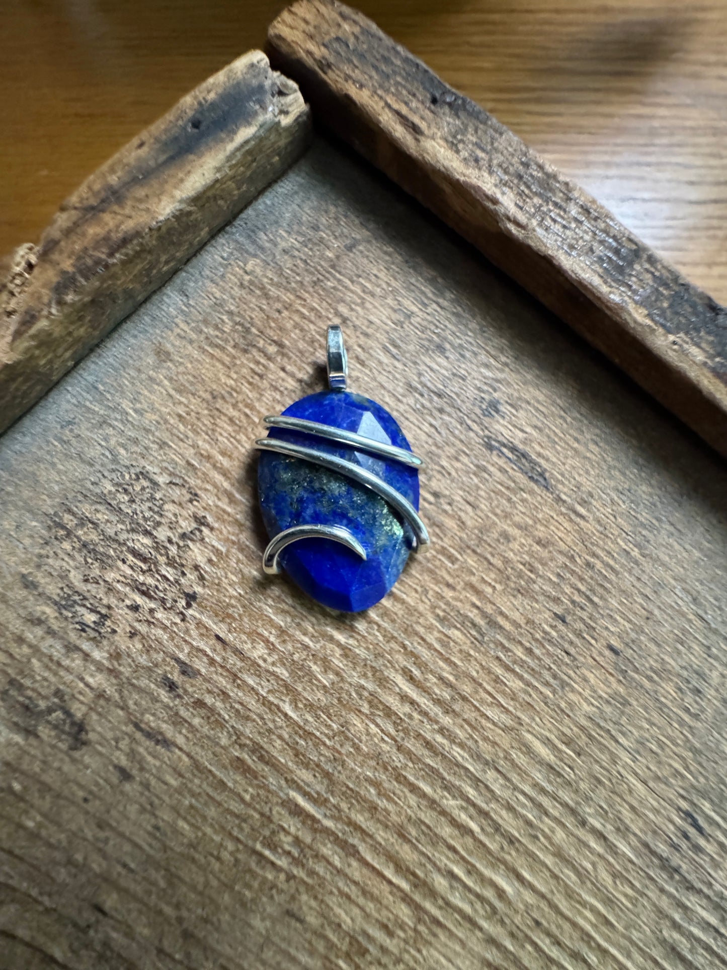 Faceted lapis in sterling silver pendant
