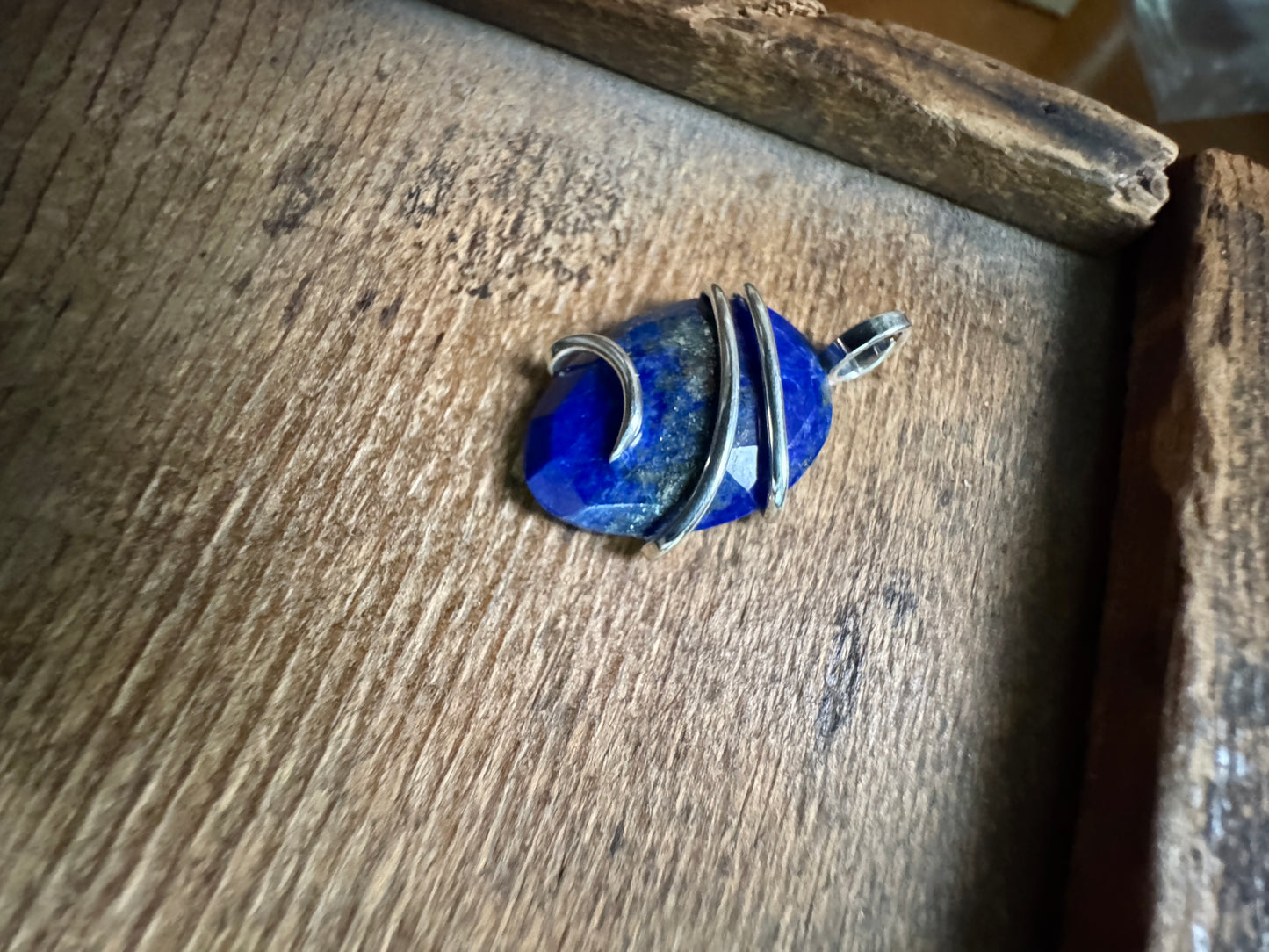 Faceted lapis in sterling silver pendant