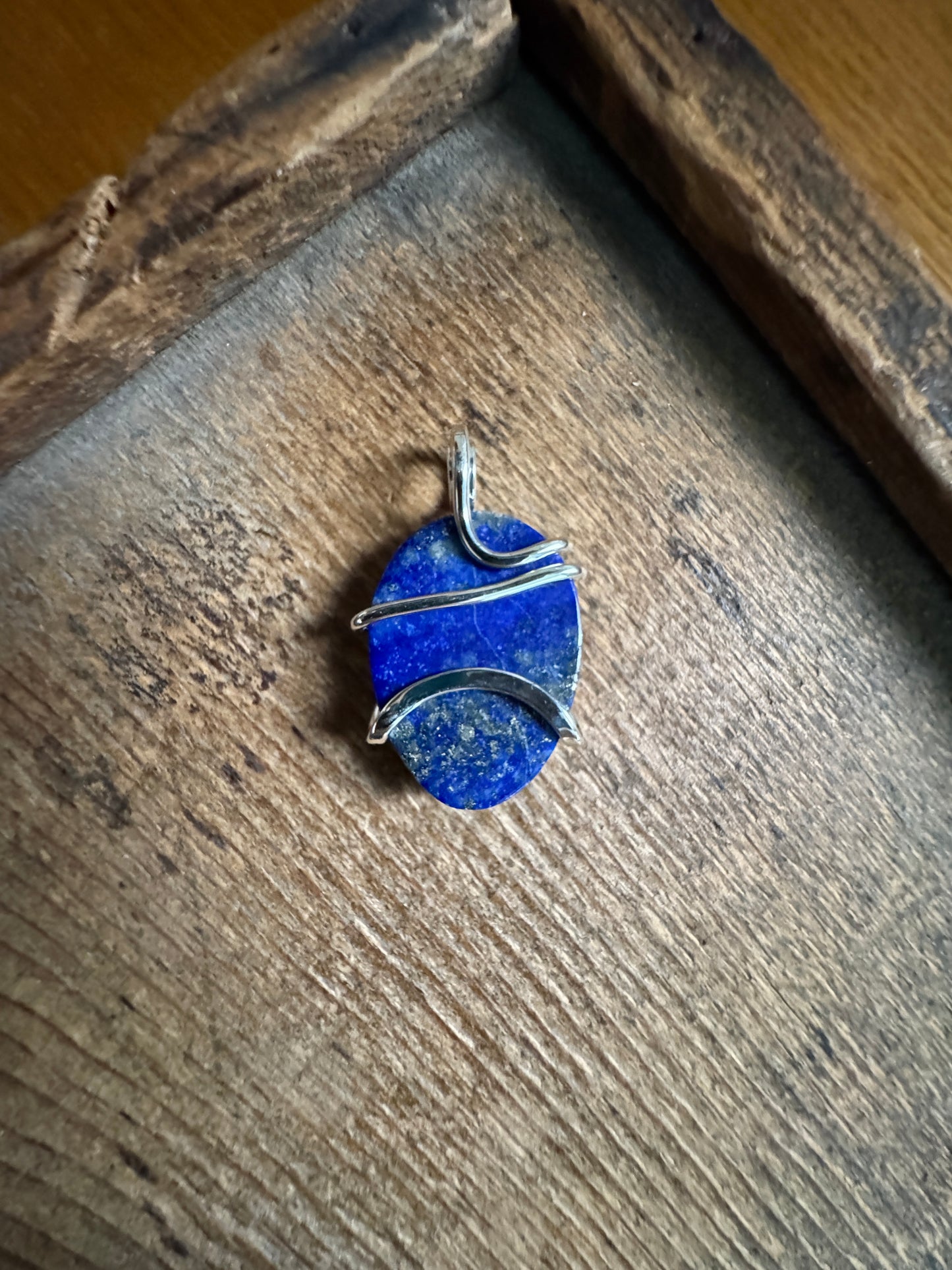 Faceted lapis in sterling silver pendant