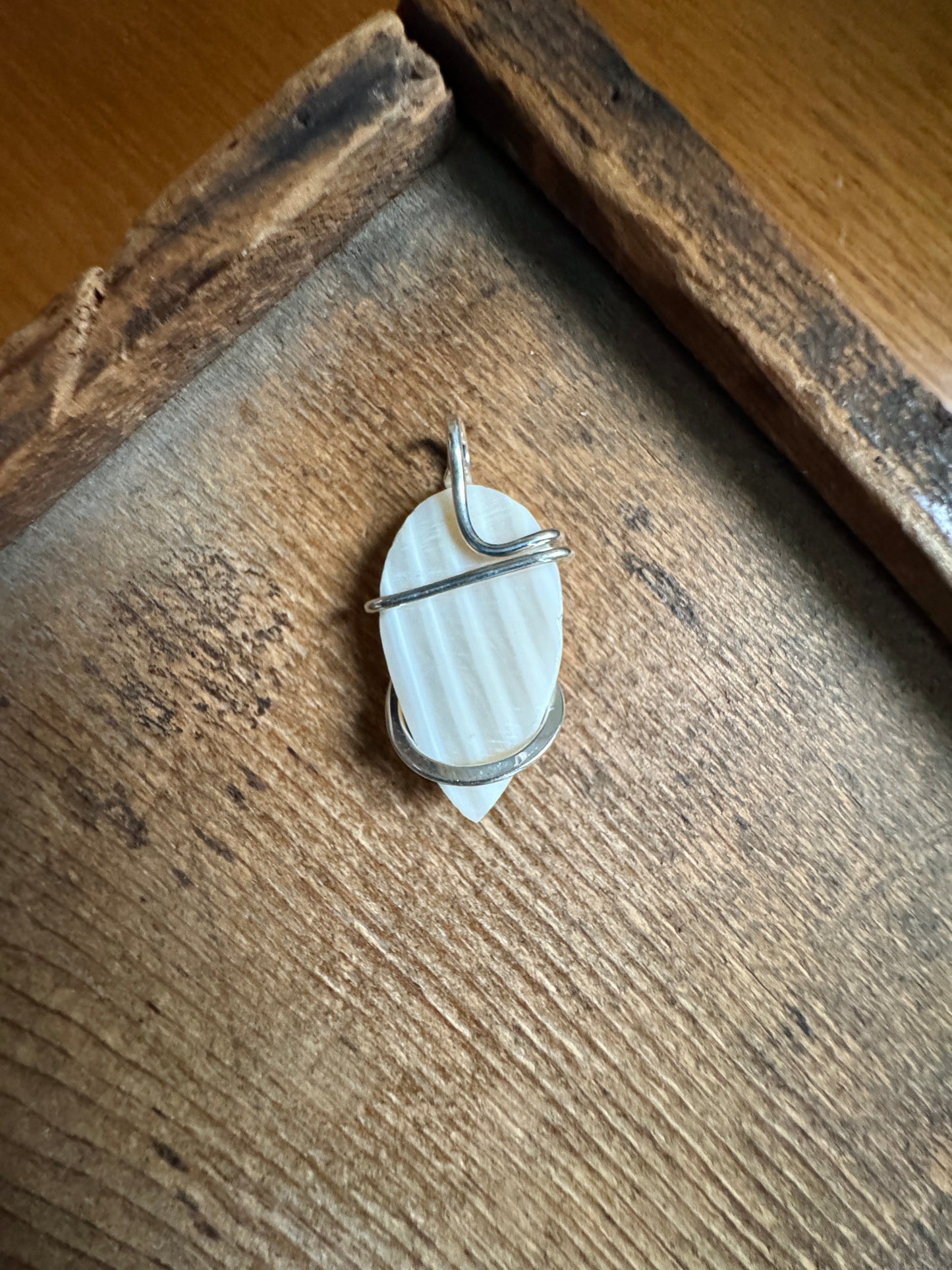 Shell in forged sterling silver pendant