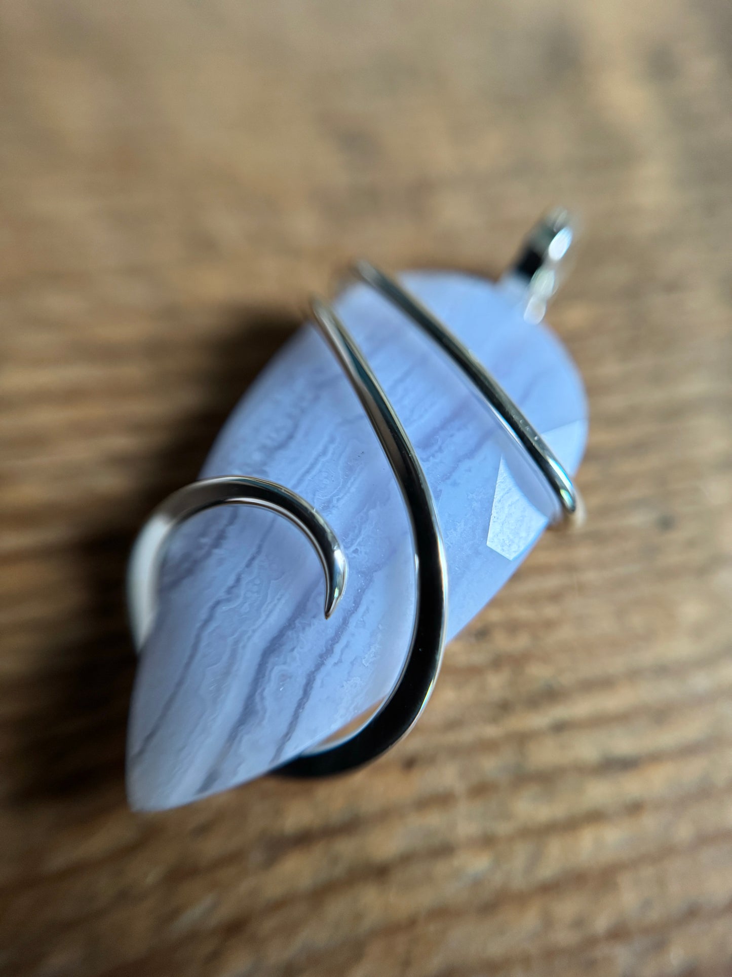 Faceted blue lace agate in sterling silver pendant
