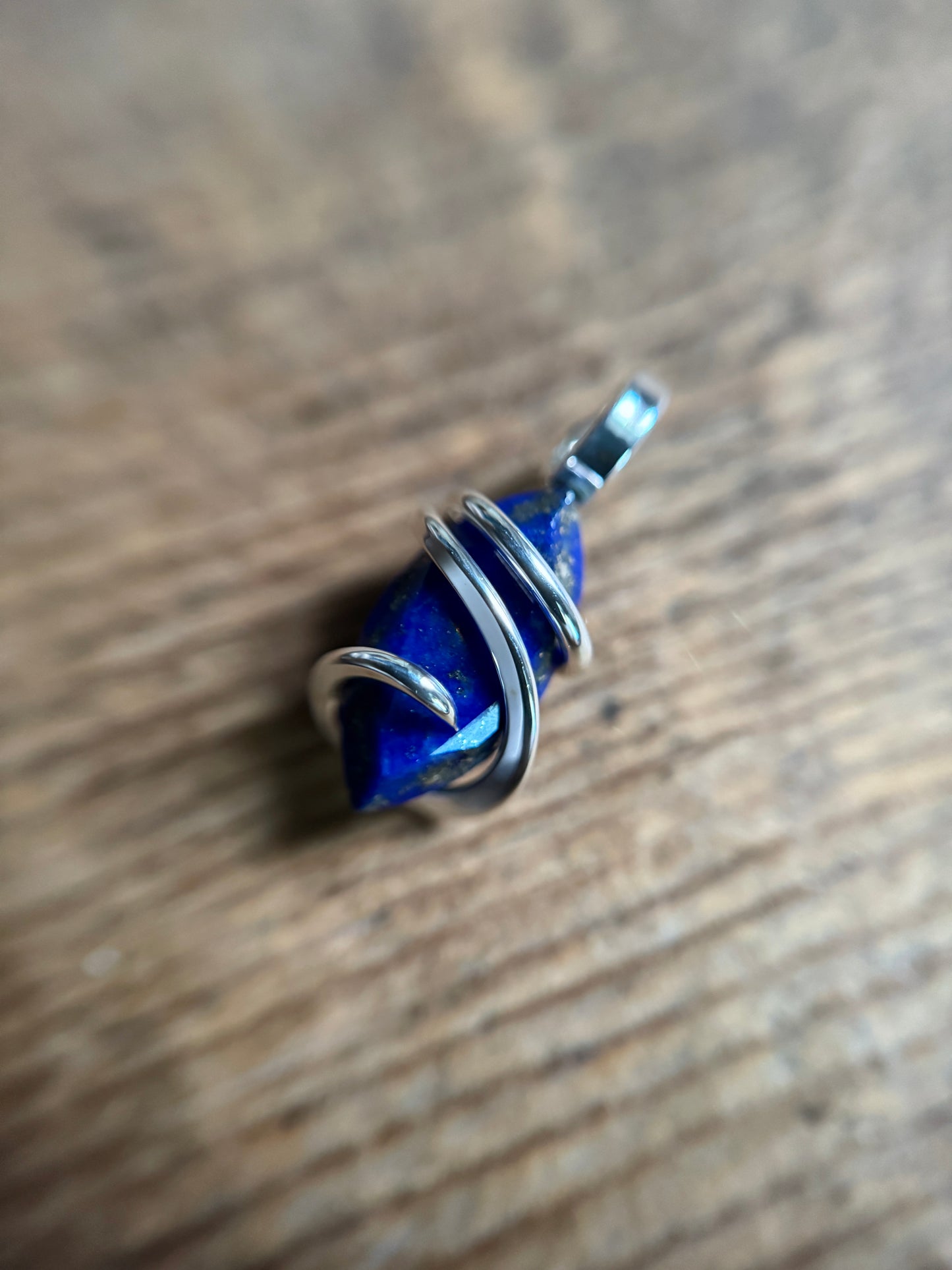 Faceted lapis in sterling silver pendant