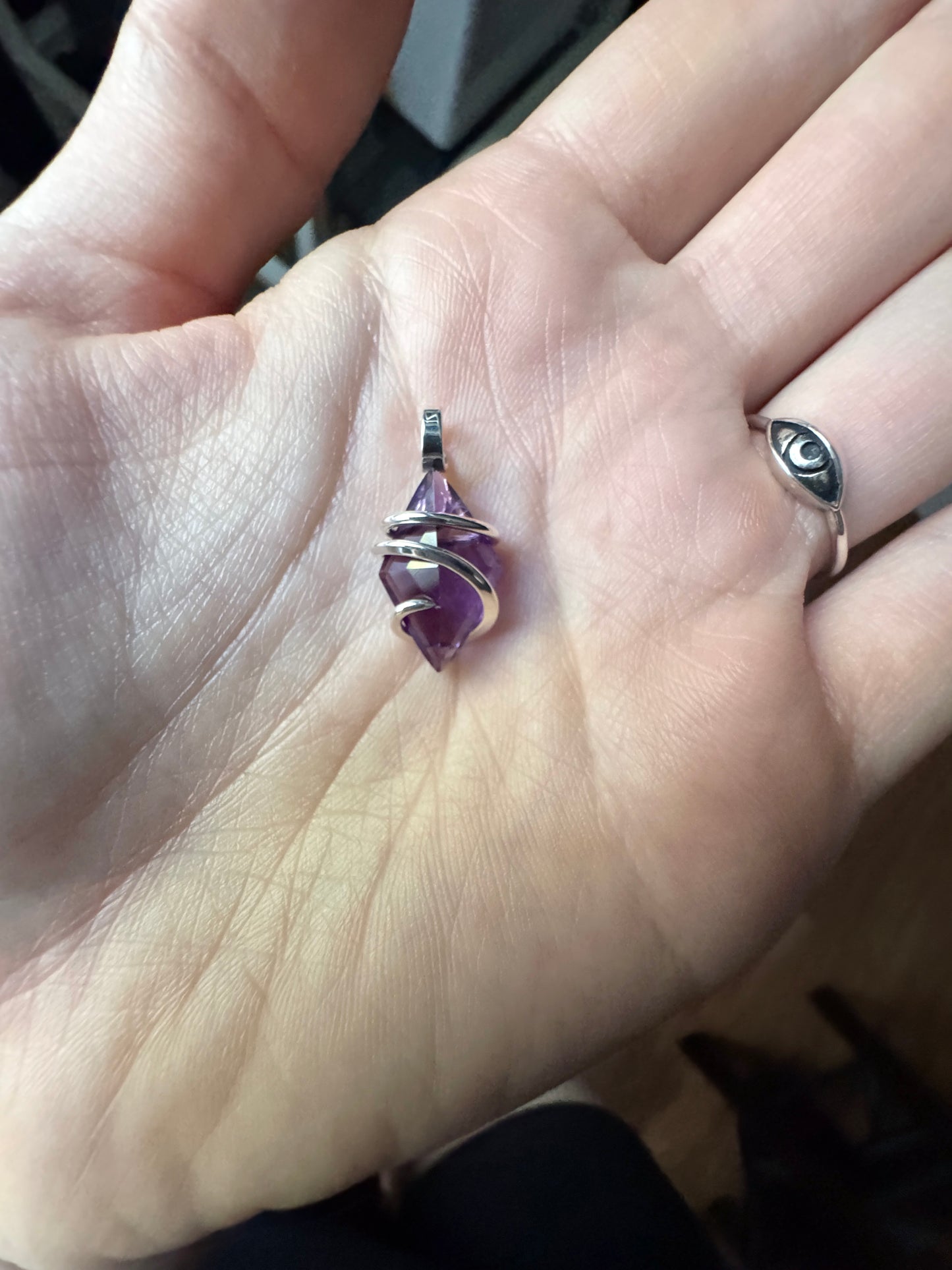 Faceted amethyst in sterling silver pendant