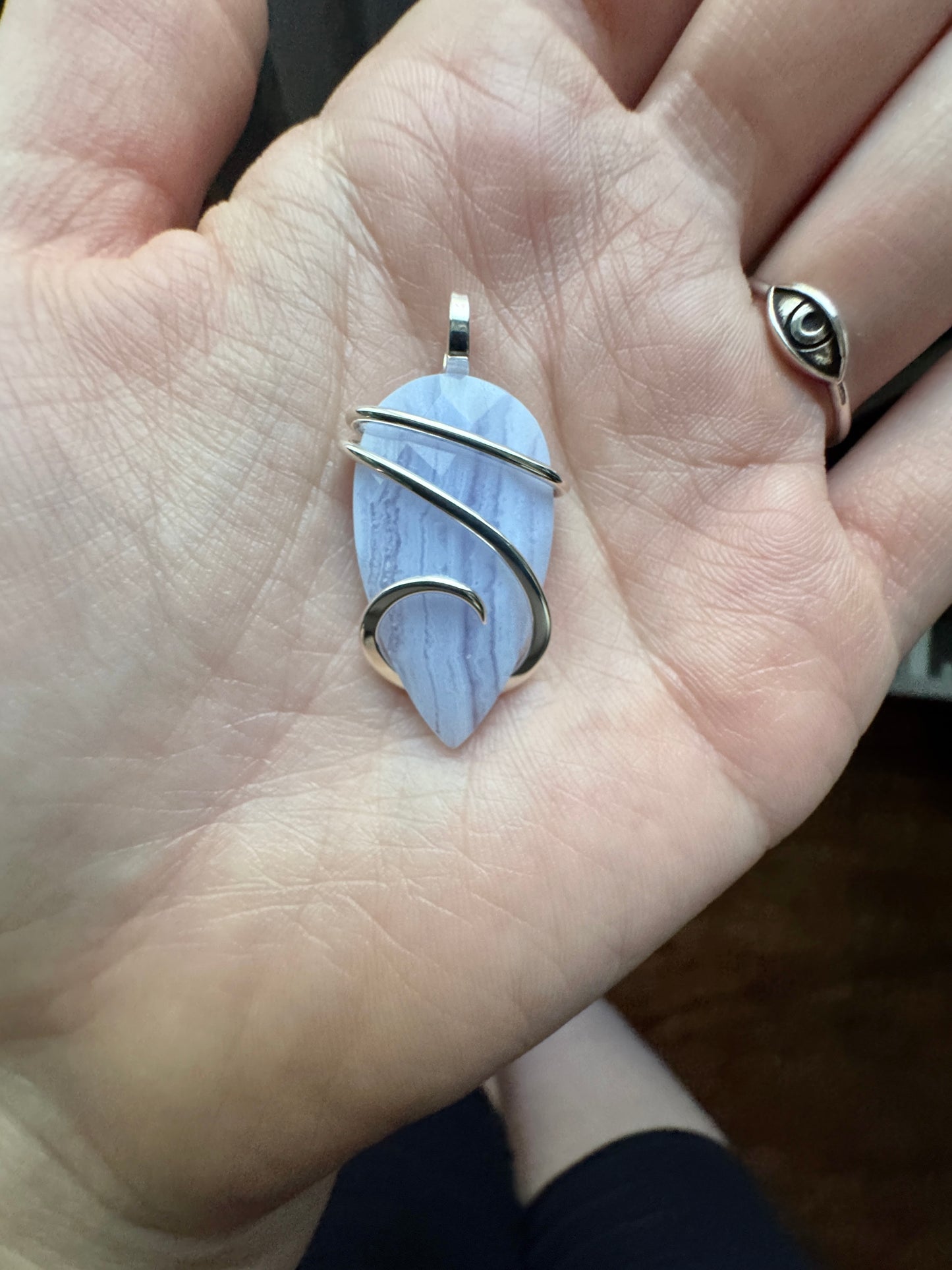 Faceted blue lace agate in sterling silver pendant