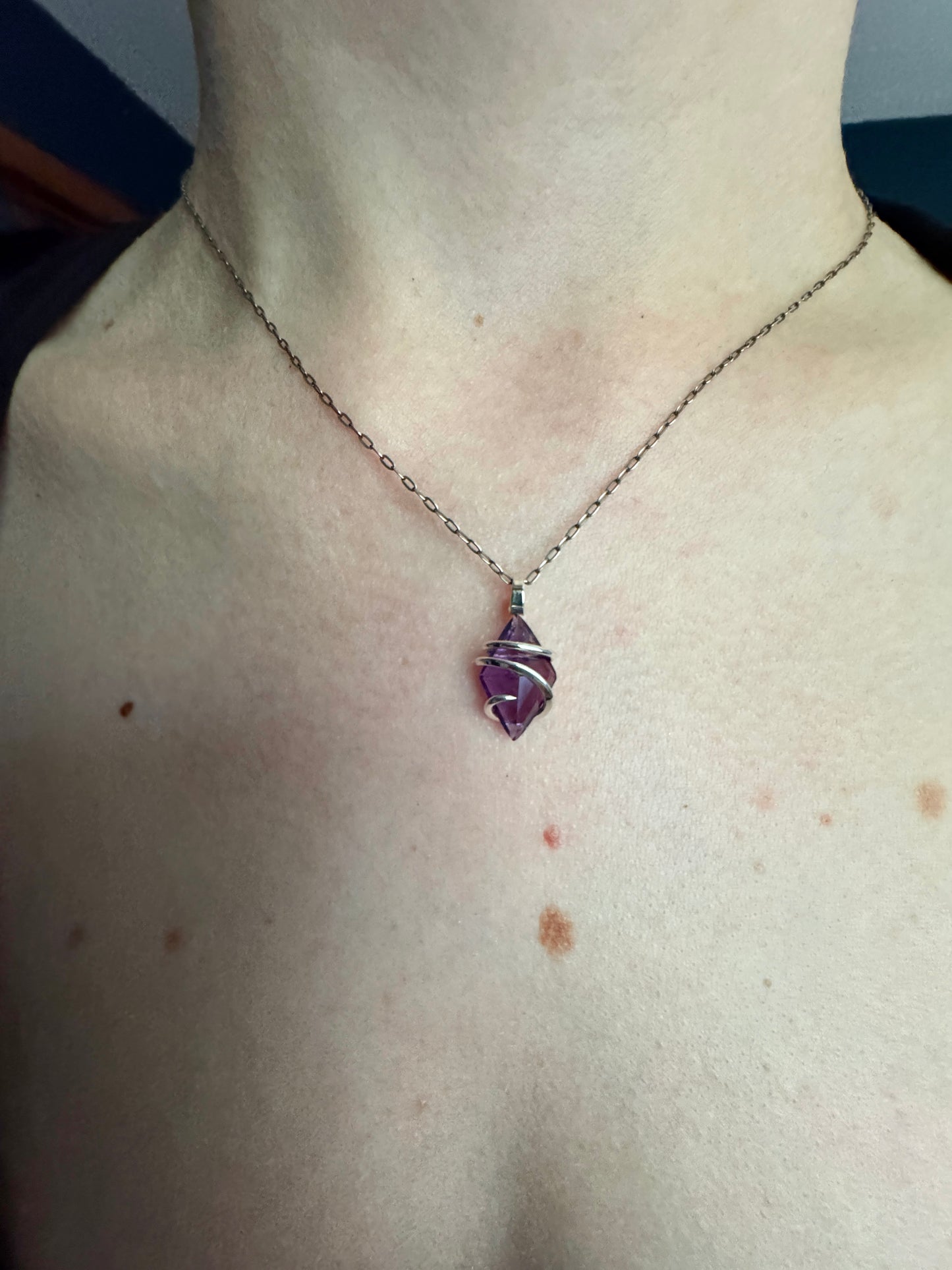 Faceted amethyst in sterling silver pendant