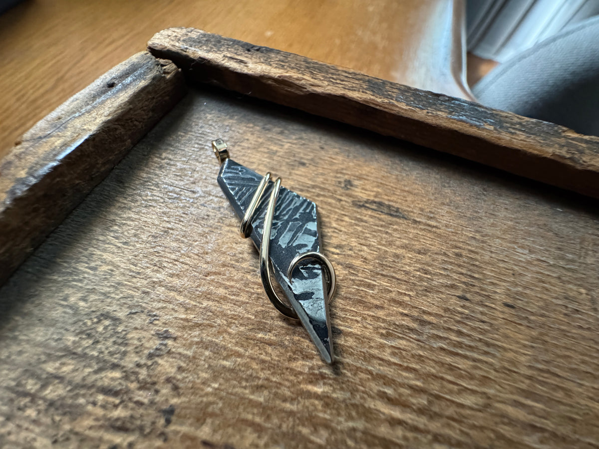 Meteorite in 14k gold pendant