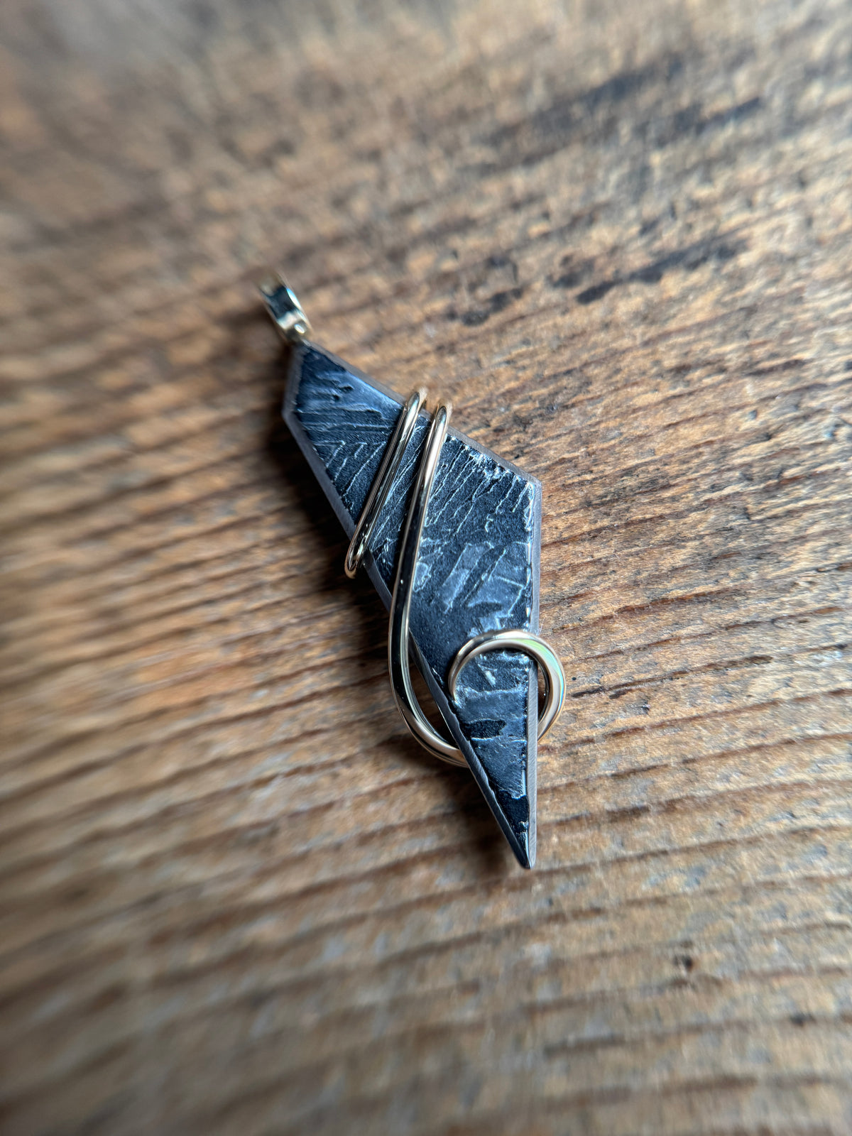 Meteorite in 14k gold pendant