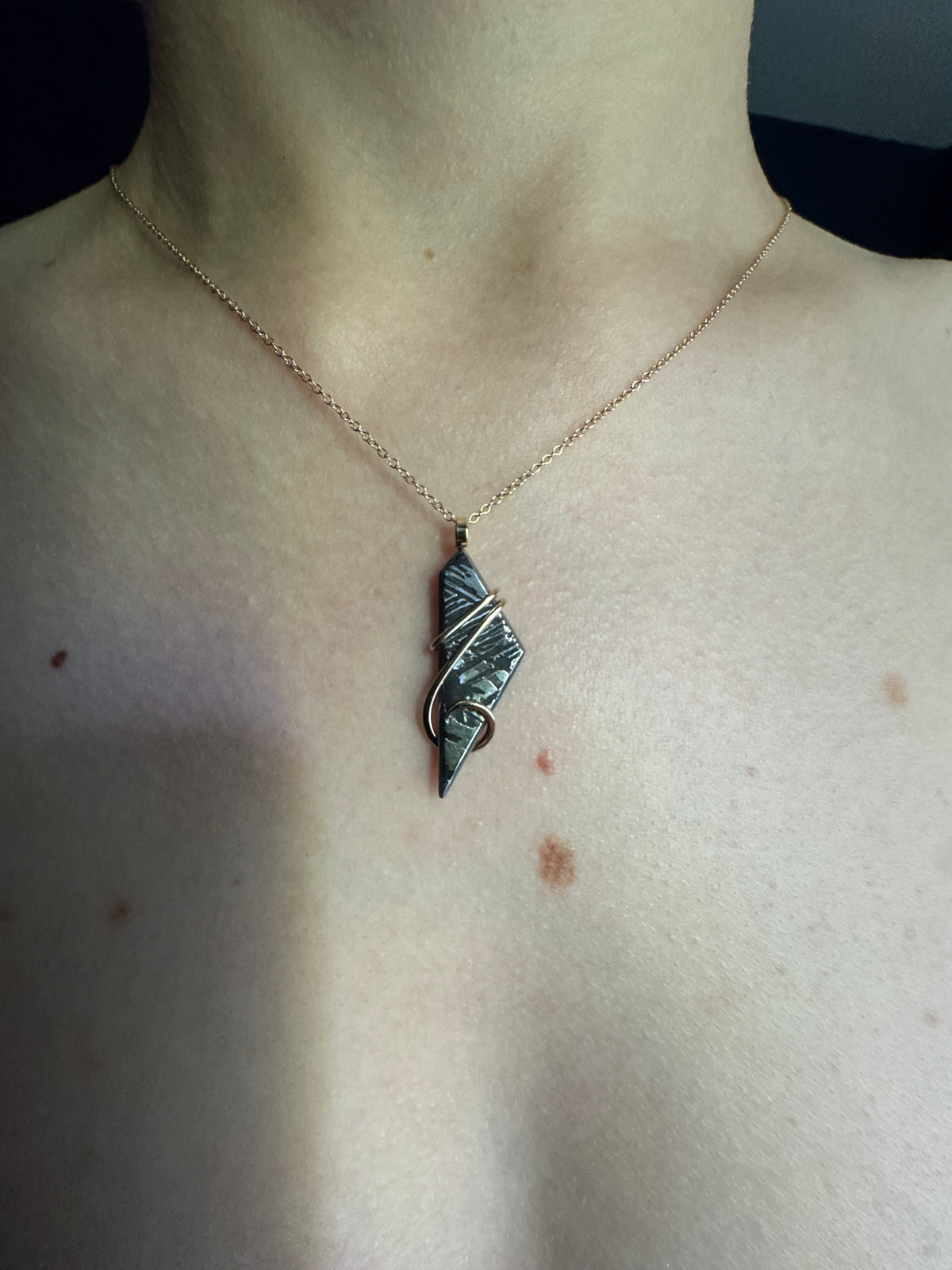 Meteorite in 14k gold pendant