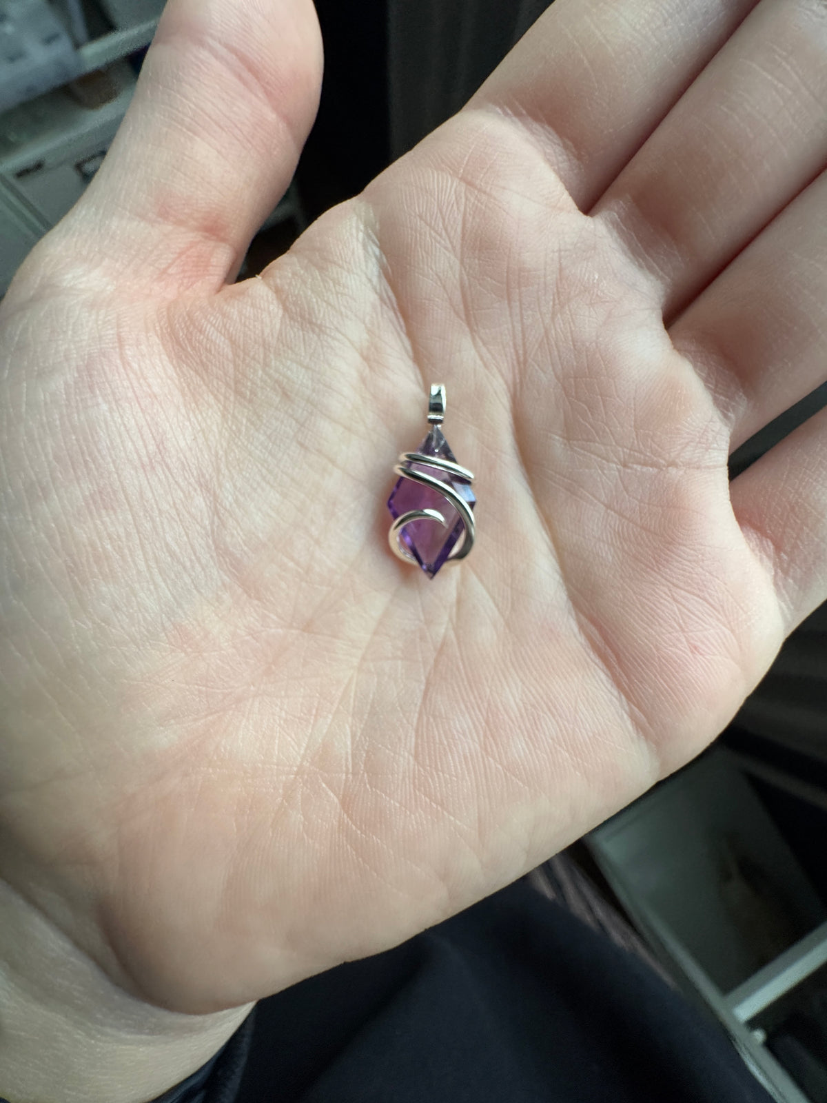 Faceted amethyst in sterling silver pendant