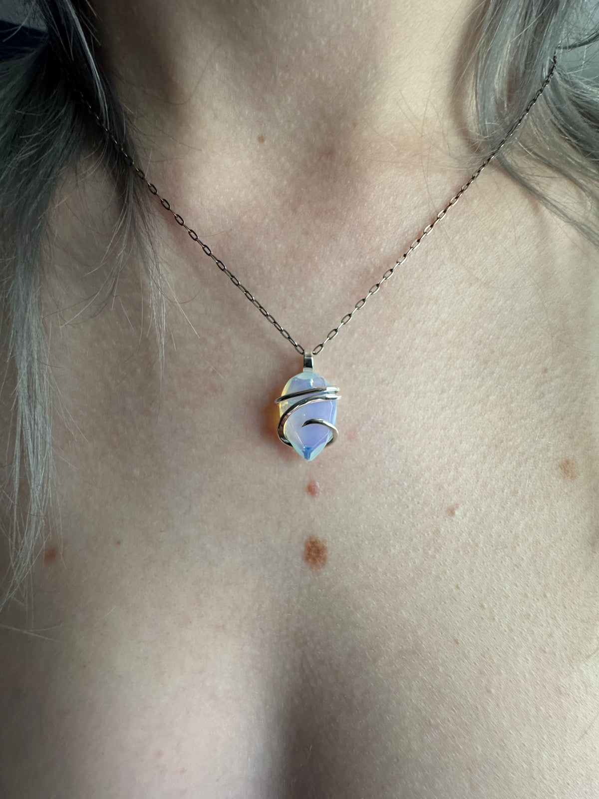 Faceted opalite in sterling silver pendant