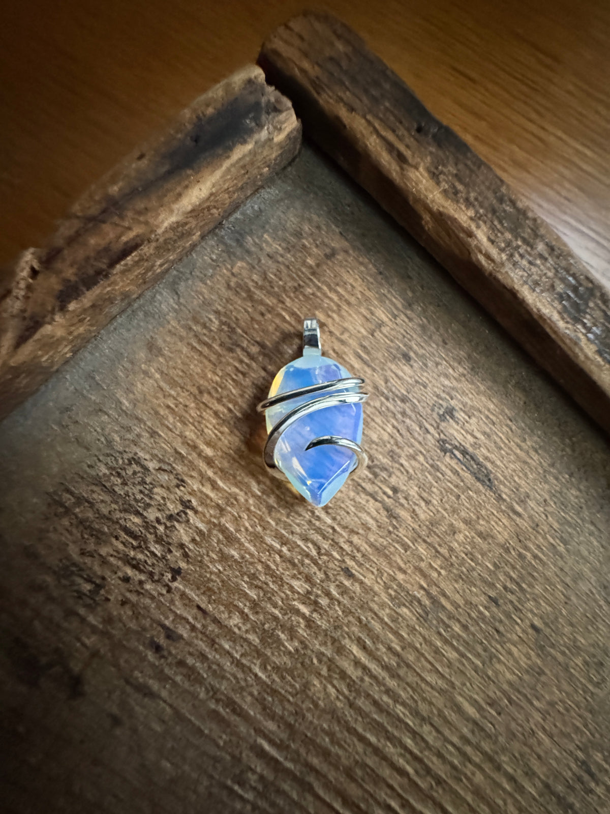 Faceted opalite in sterling silver pendant