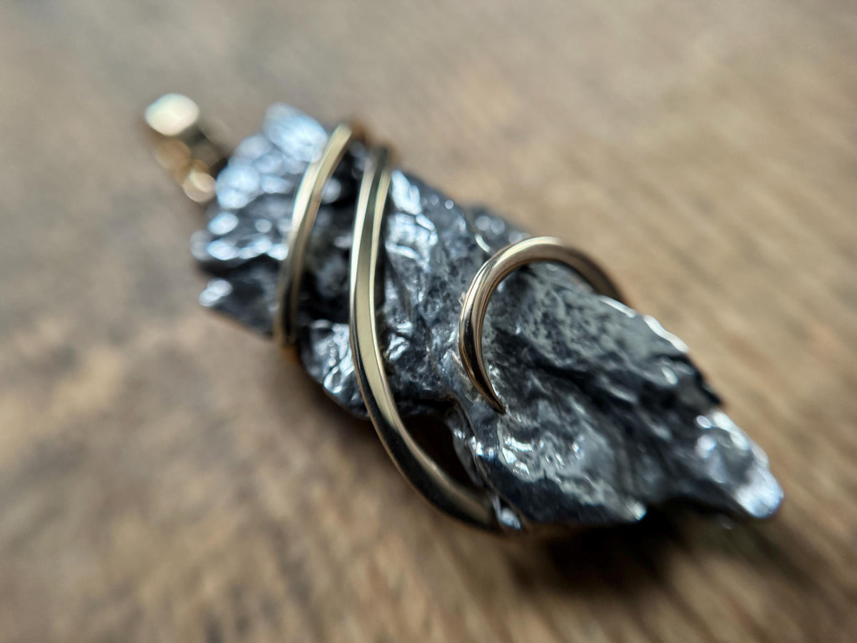 Meteorite in forged 14k gold pendant