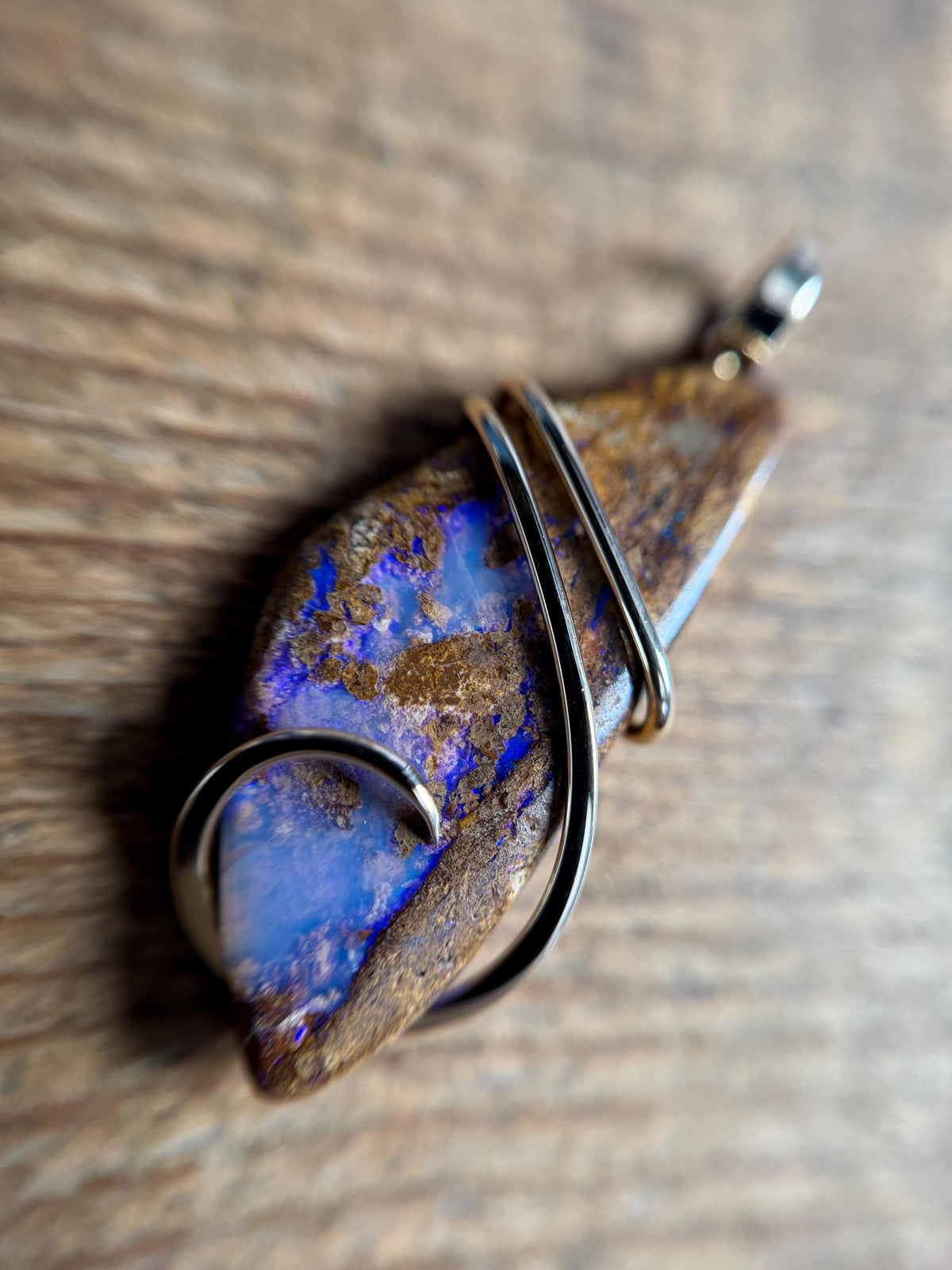 Boulder opal in 14k gold pendant
