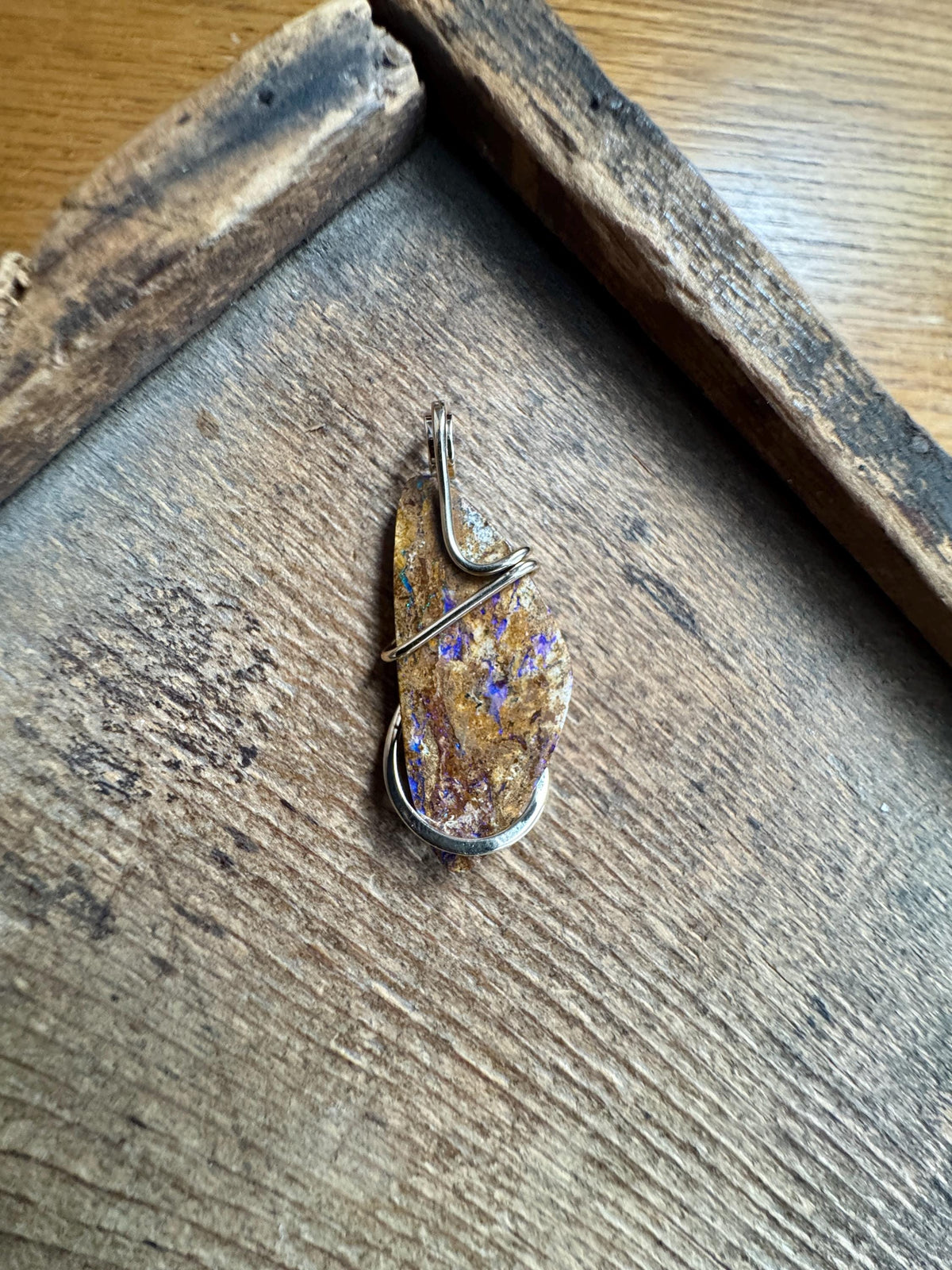 Boulder opal in 14k gold pendant