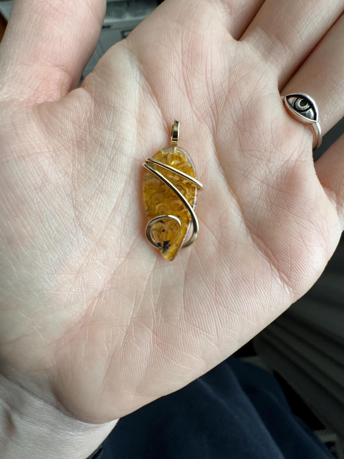 Fern fossil in 14k gold pendant