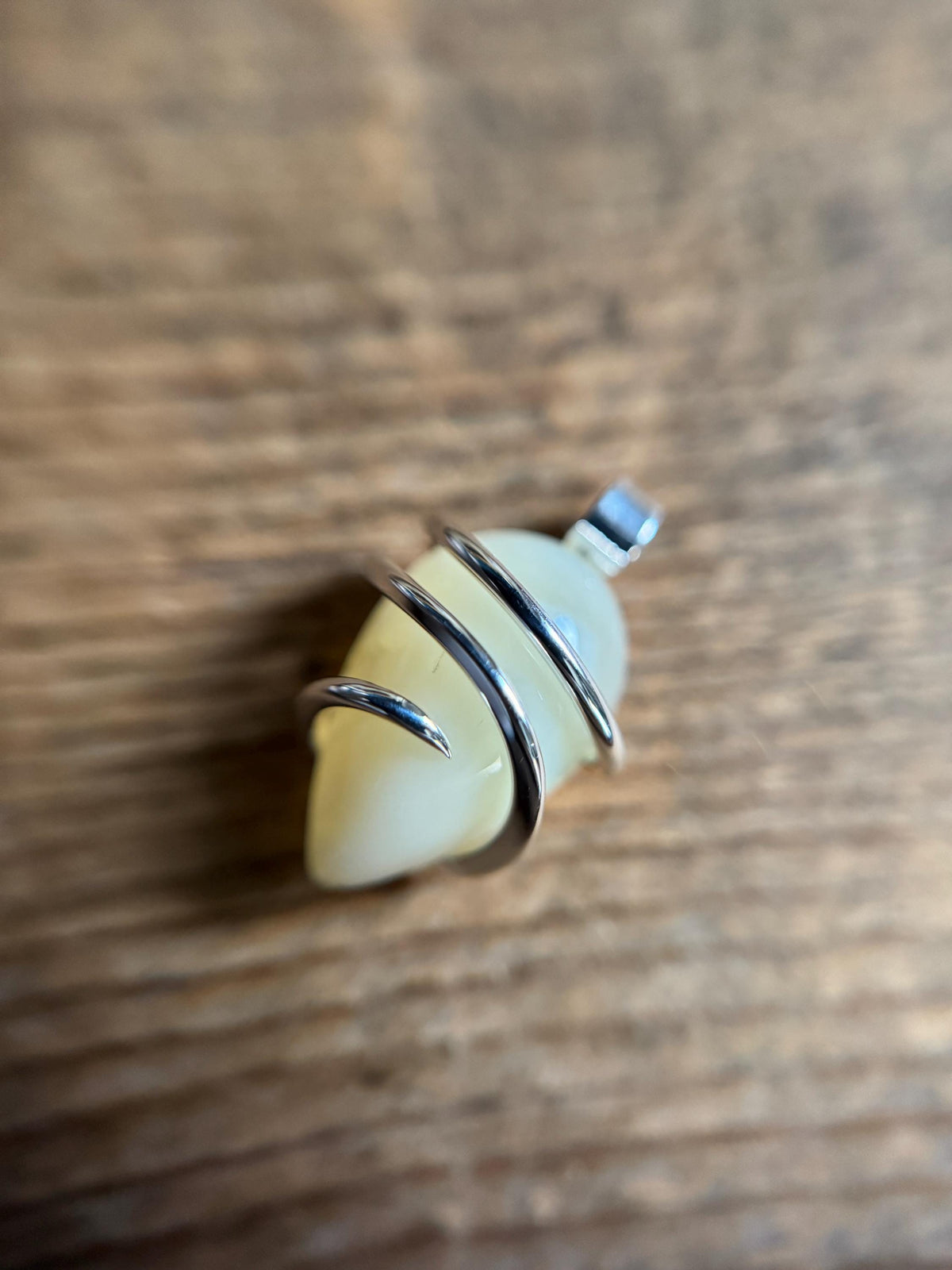 Yellow opal set in forged sterling silver pendant