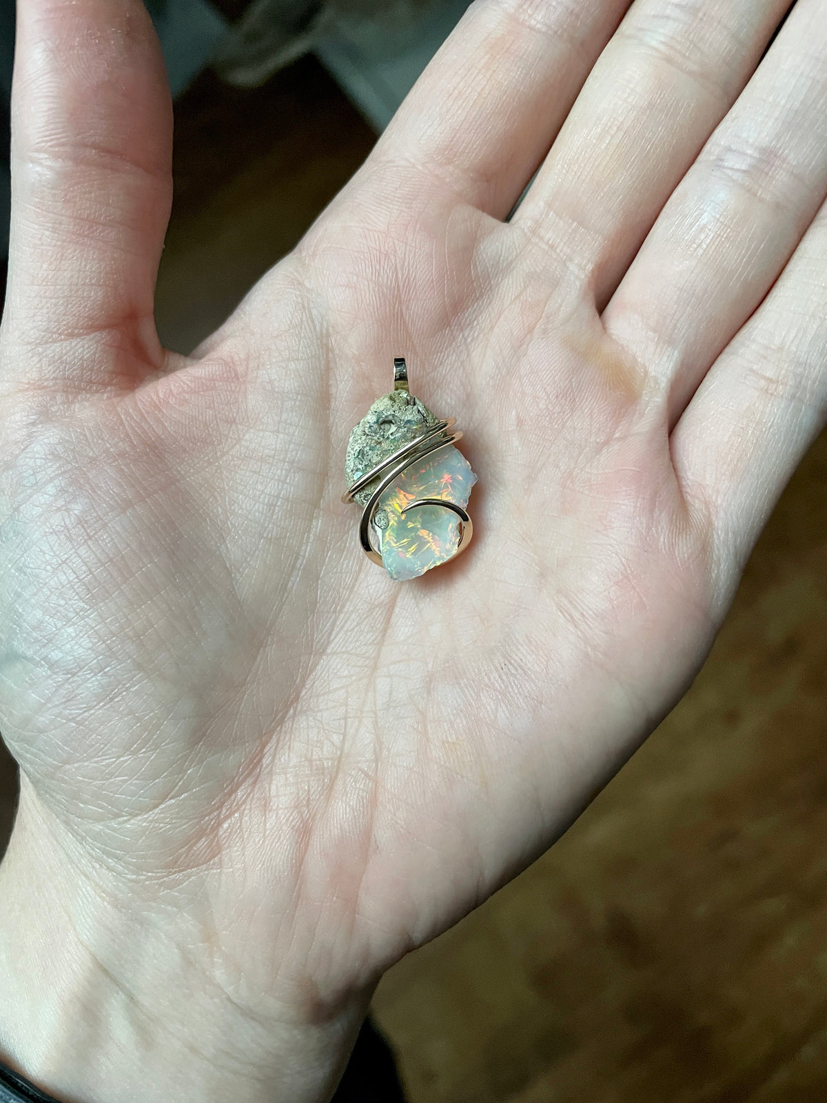 Opal in forged 14k gold pendant