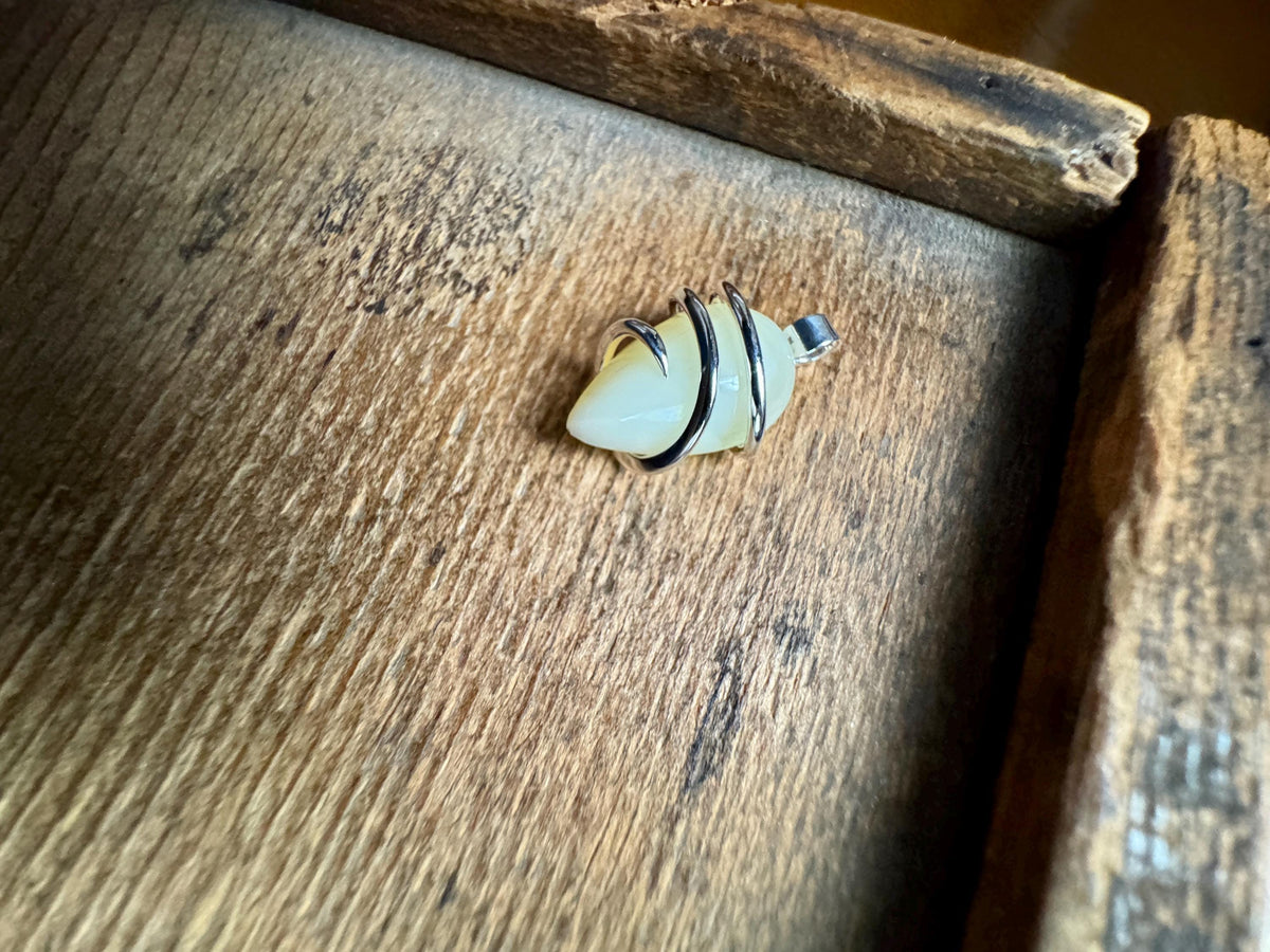 Yellow opal set in forged sterling silver pendant