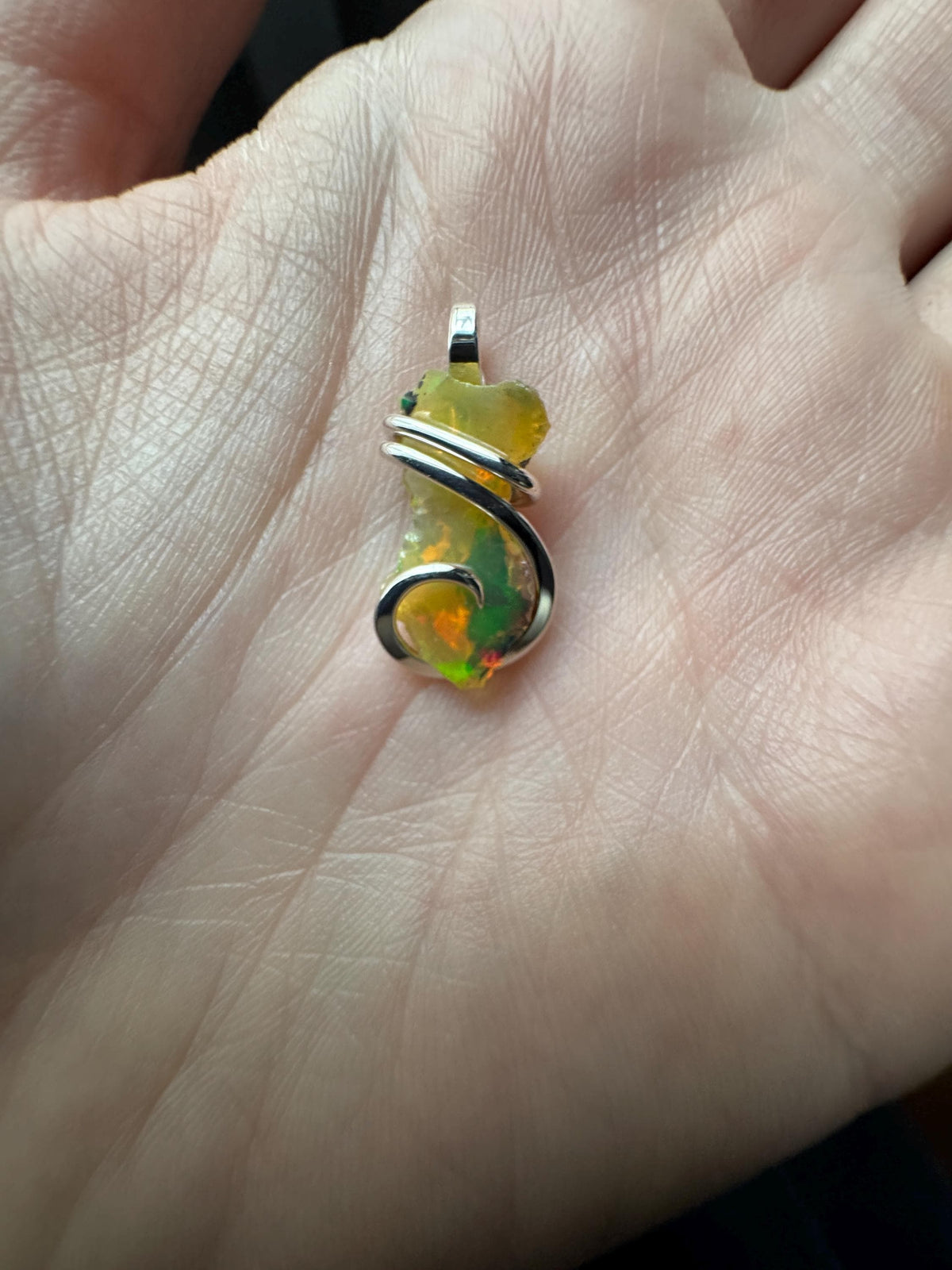 Welo opal in sterling silver pendant
