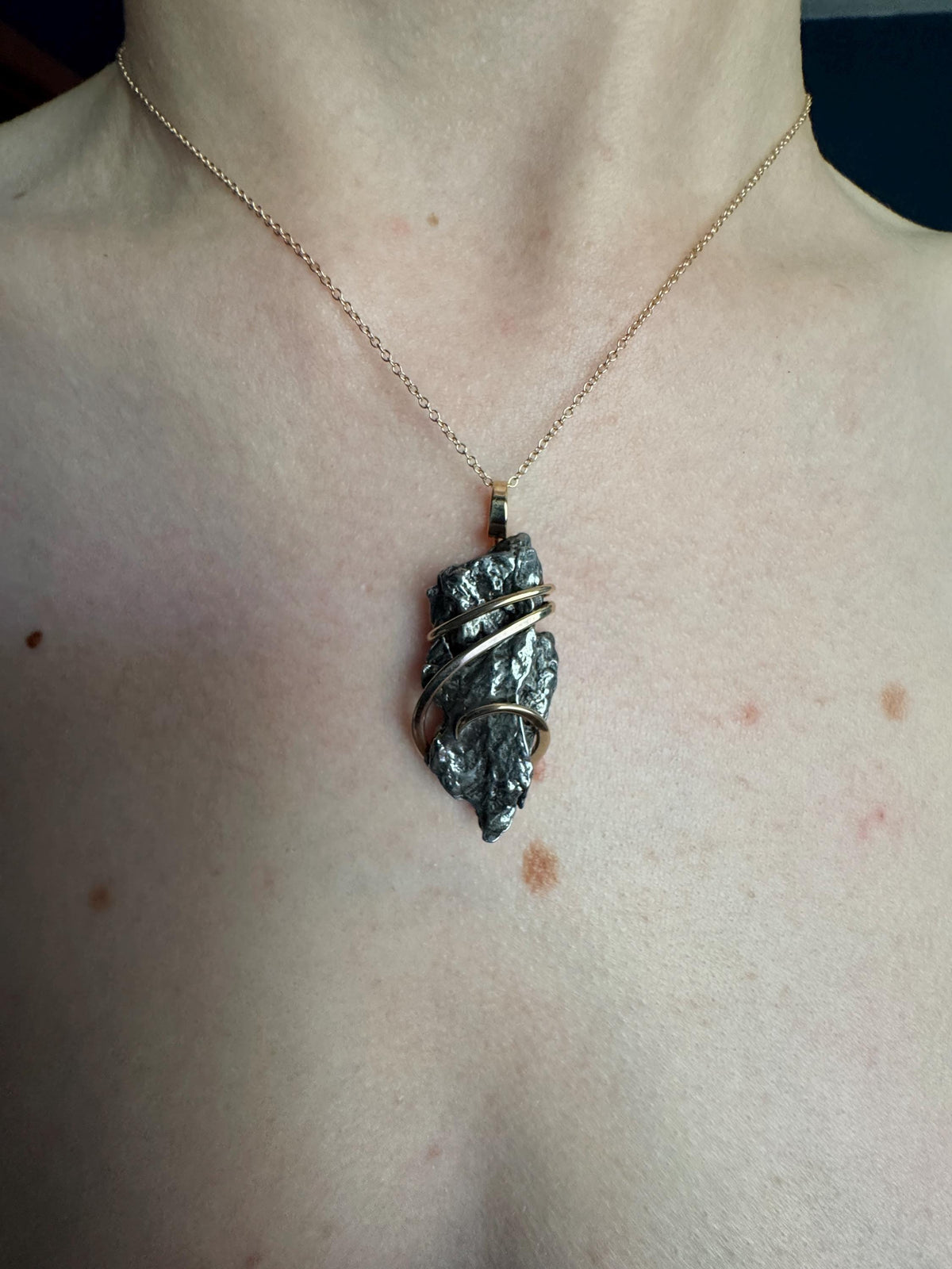 Meteorite in forged 14k gold pendant