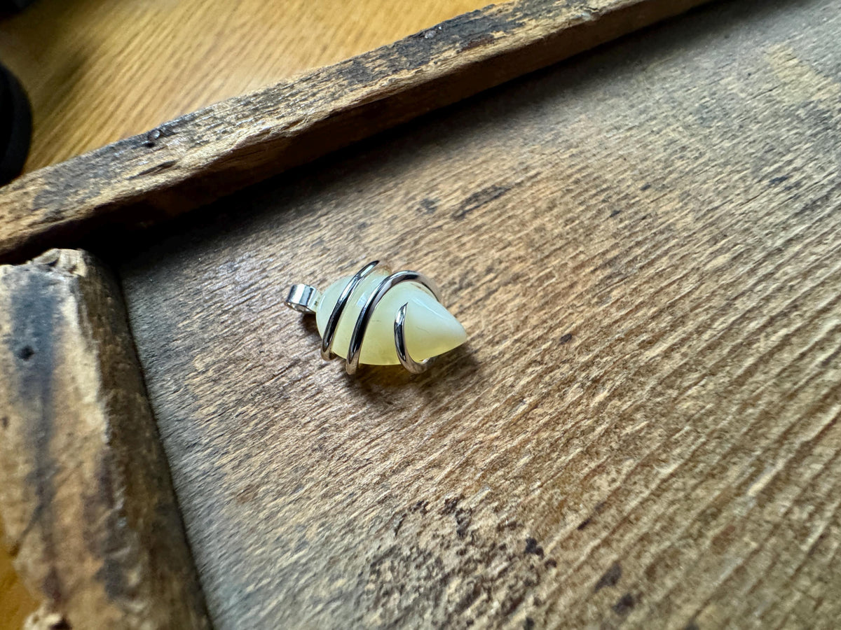 Yellow opal set in forged sterling silver pendant
