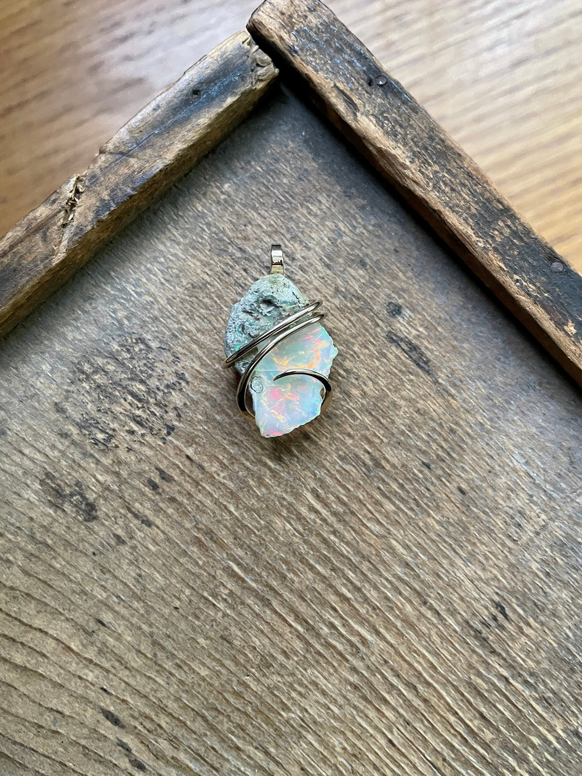 Opal in forged 14k gold pendant