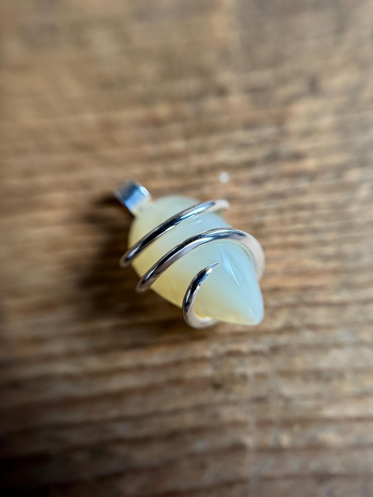 Yellow opal set in forged sterling silver pendant
