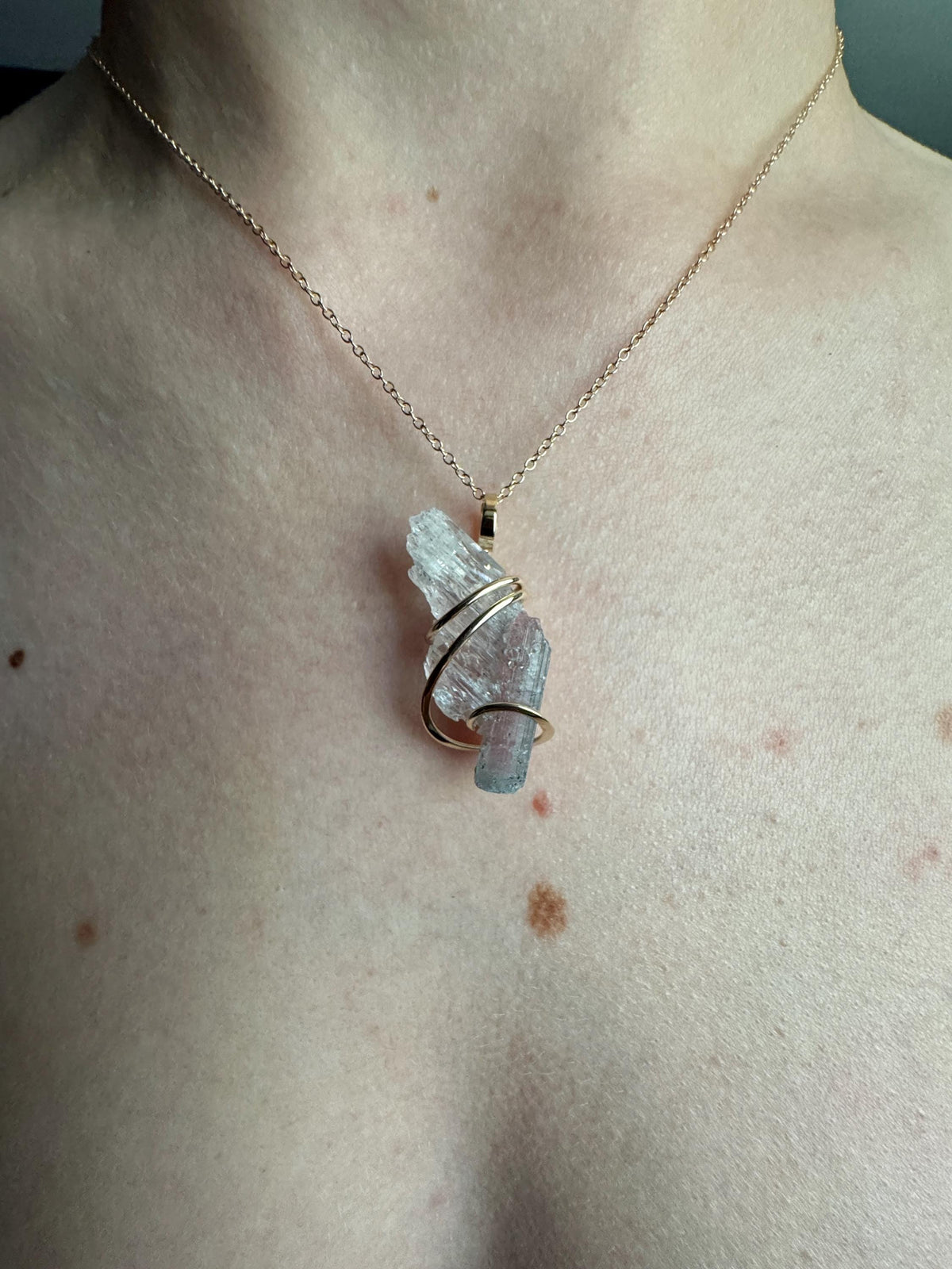Tourmaline in kunzite in 14k gold pendant
