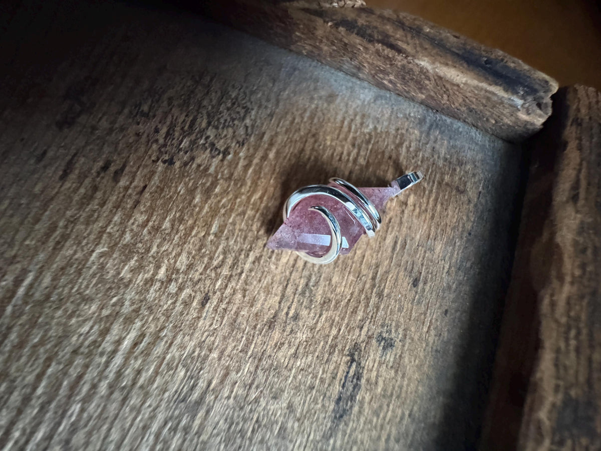 Faceted strawberry quartz in sterling silver pendant