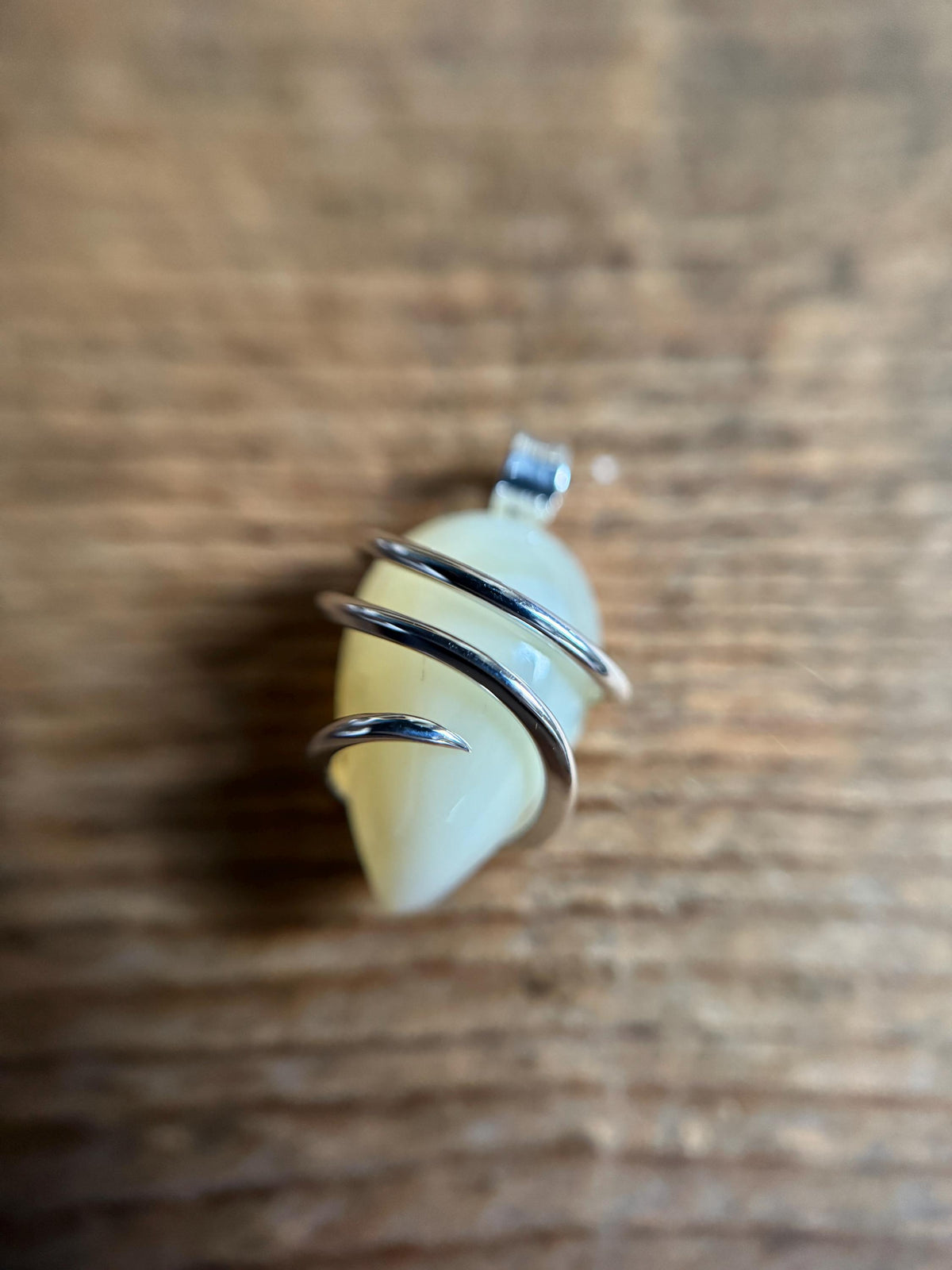 Yellow opal set in forged sterling silver pendant