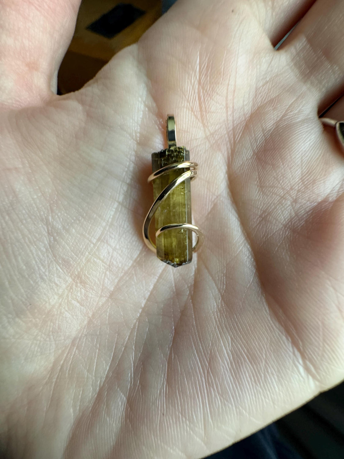 Yellow tourmaline crystal in 14k gold pendant
