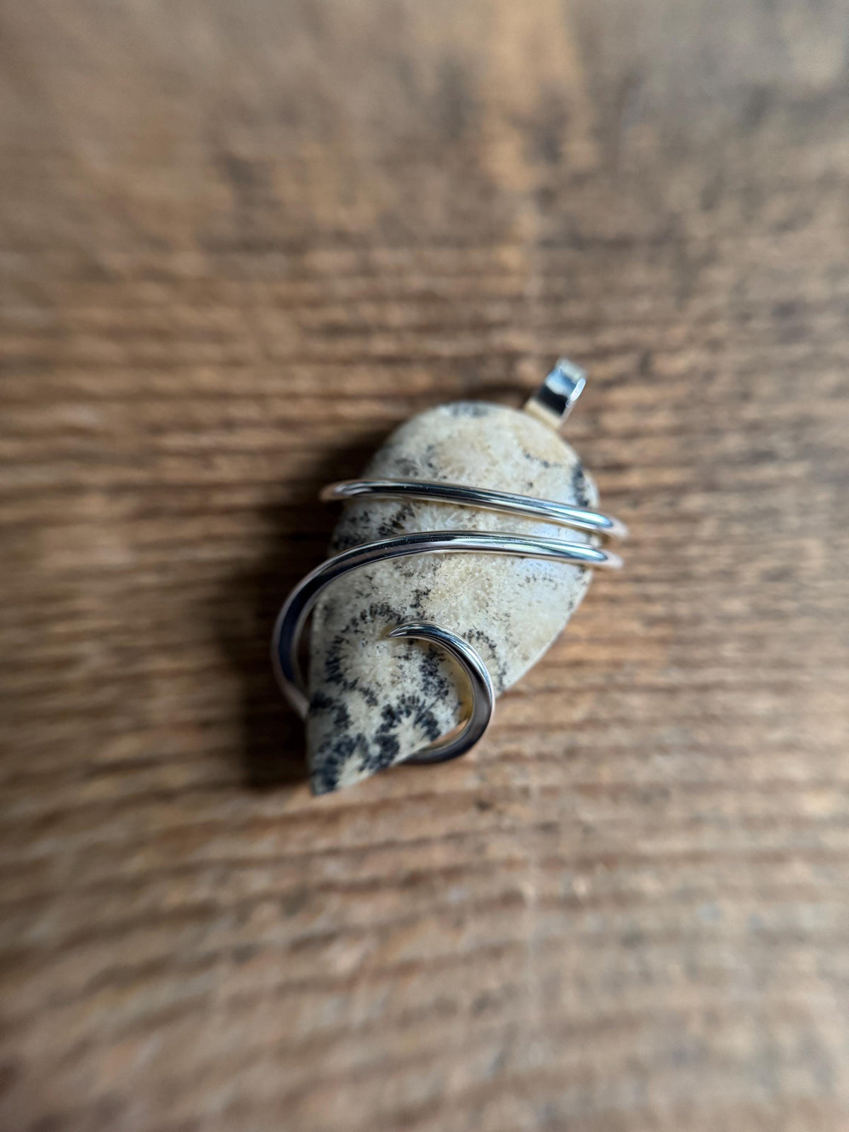 Fossilized coral in sterling silver pendant