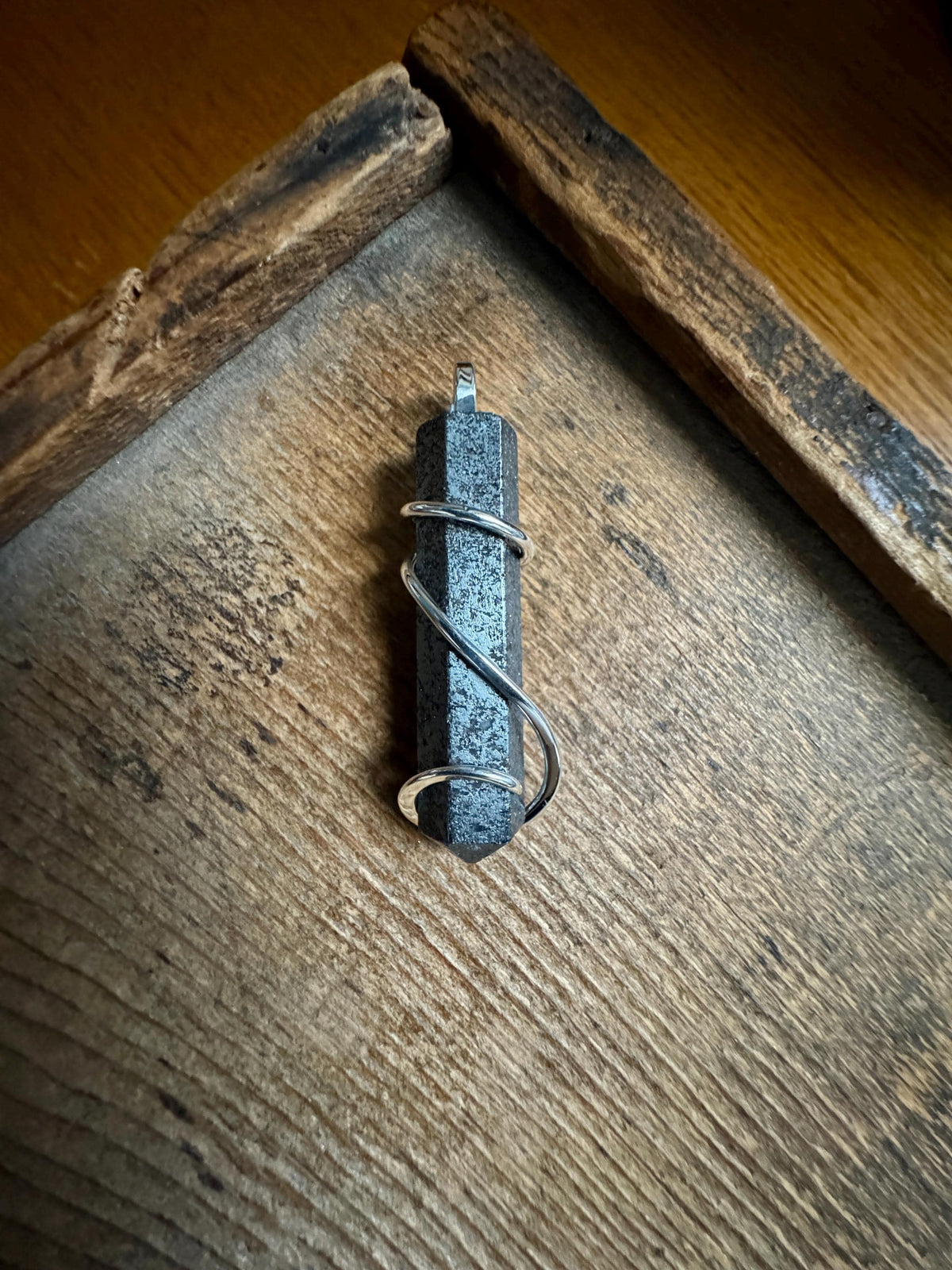 Hematite point in sterling silver pendant