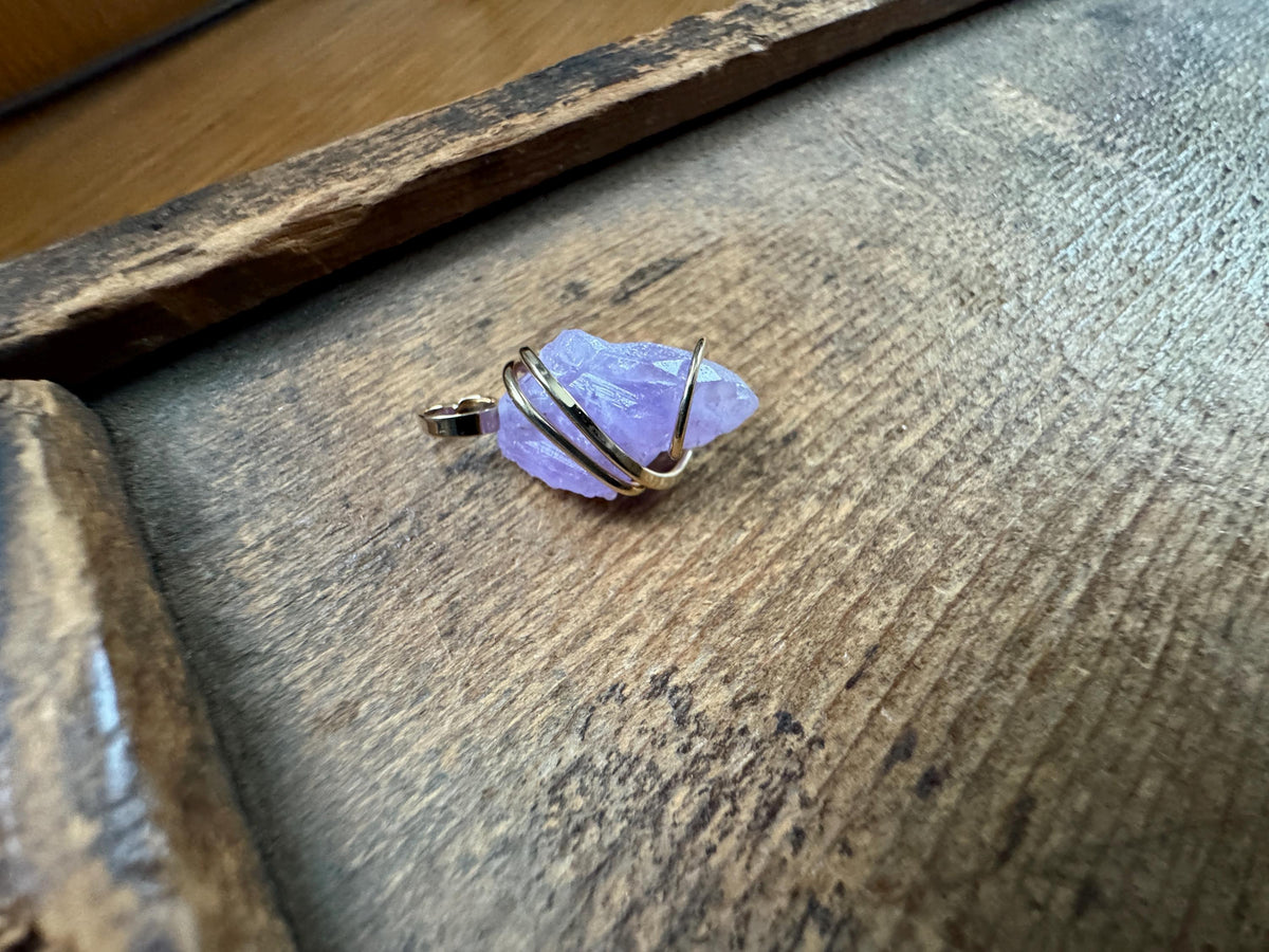 Apatite crystal in forged 14k gold pendant